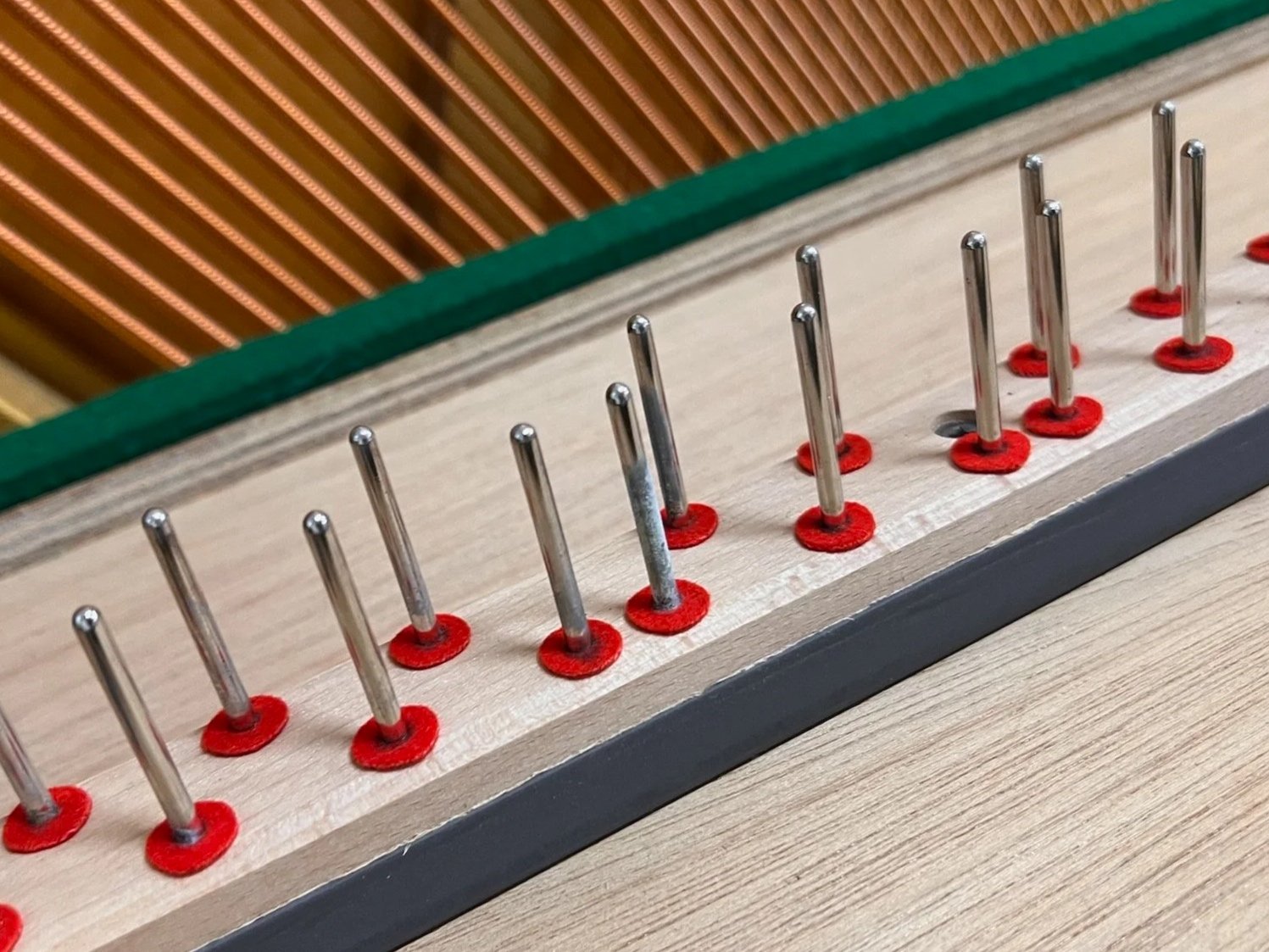 Before - Corrosion on a balance rail pin, affecting key response 