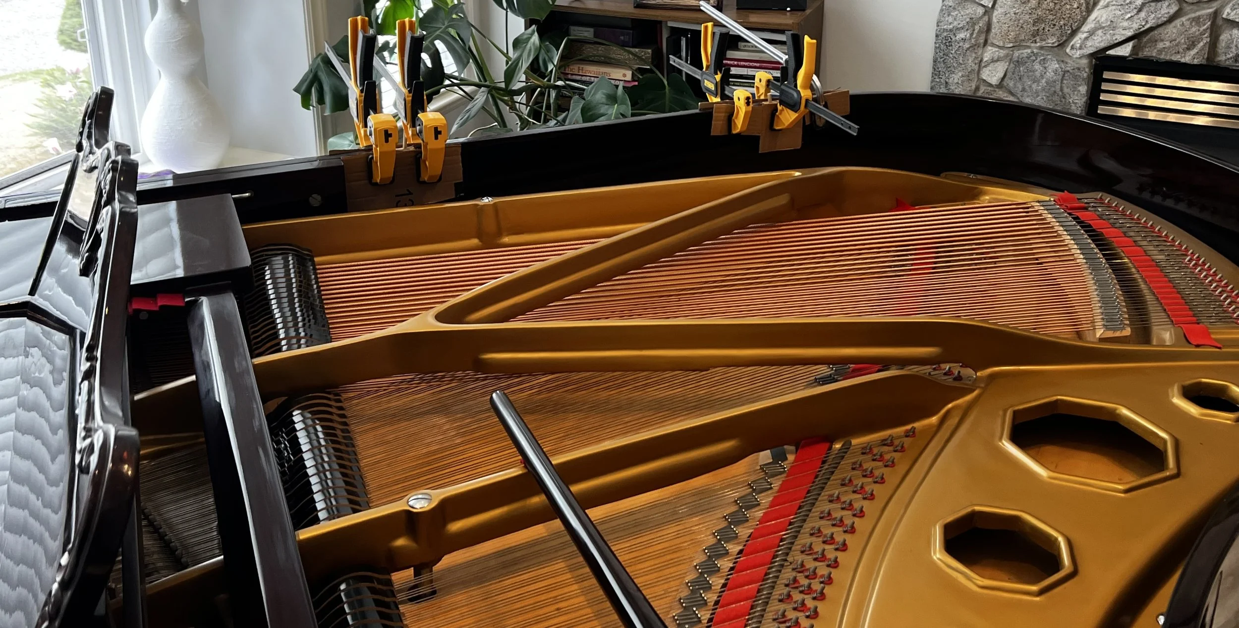 During - Clamps on for the piano case repair 
