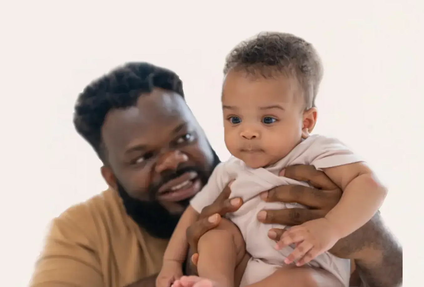 Parent holding a baby, representing families seeking answers through early genetic testing and diagnosis.