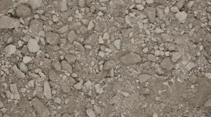 Close-up photograph of dirt and small rocks.