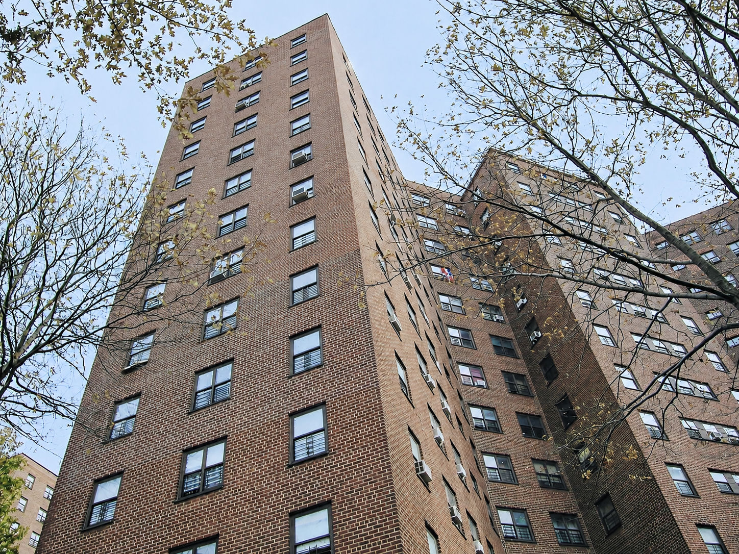 NYCHA brick apartment building Section 3 construction management
