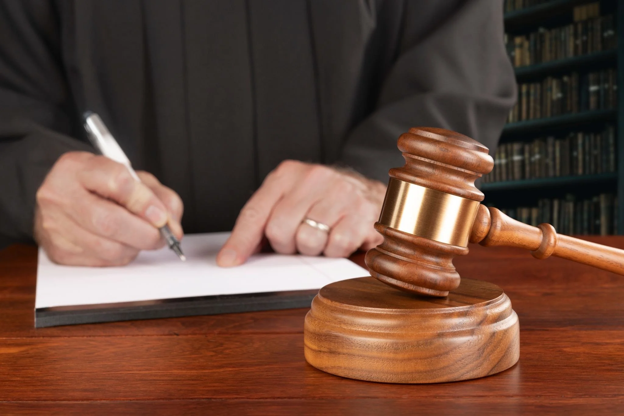 Circuit judge issuing court orders beside a gavel