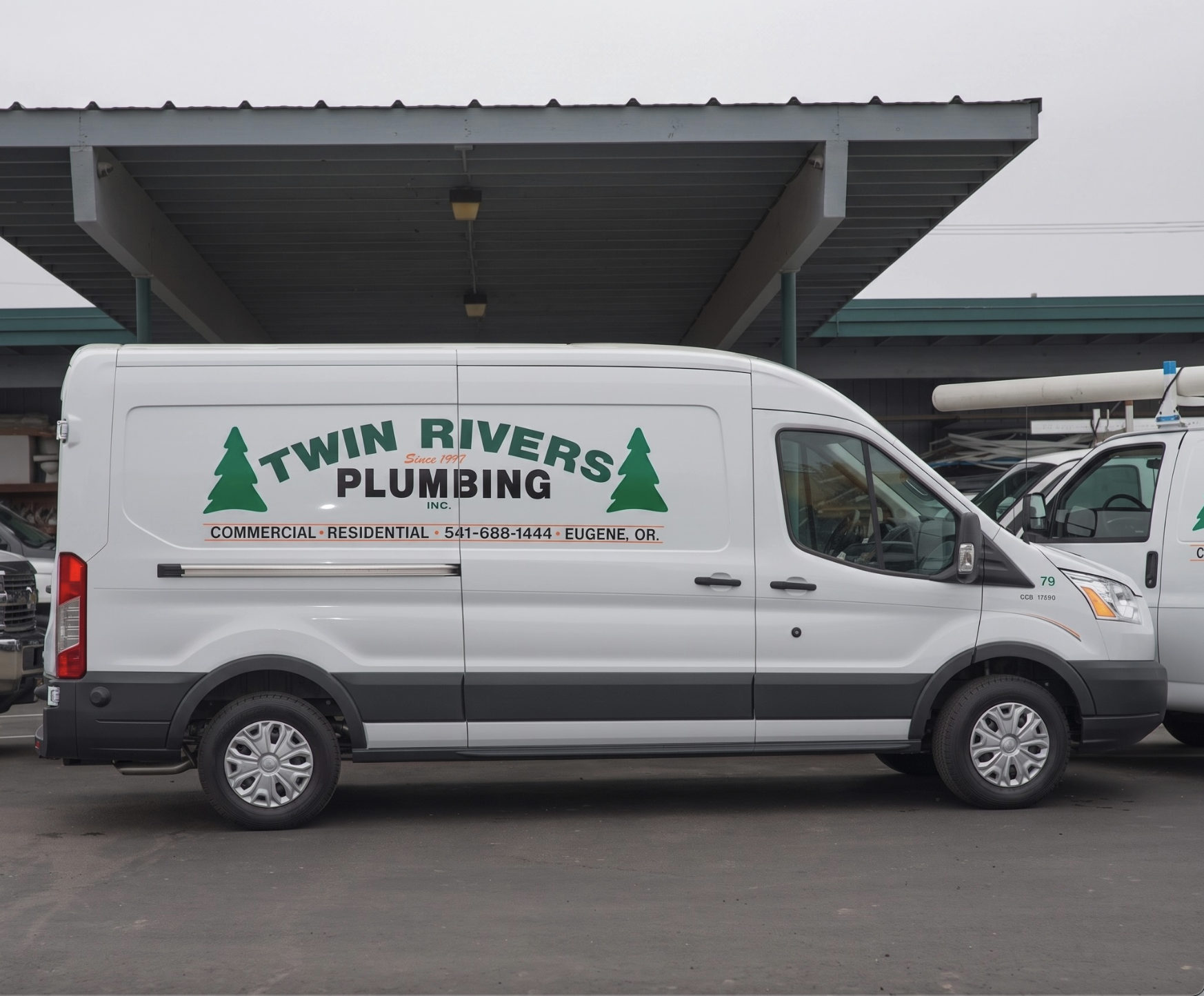 Photo of van with "Twin Rivers Plumbing" logo