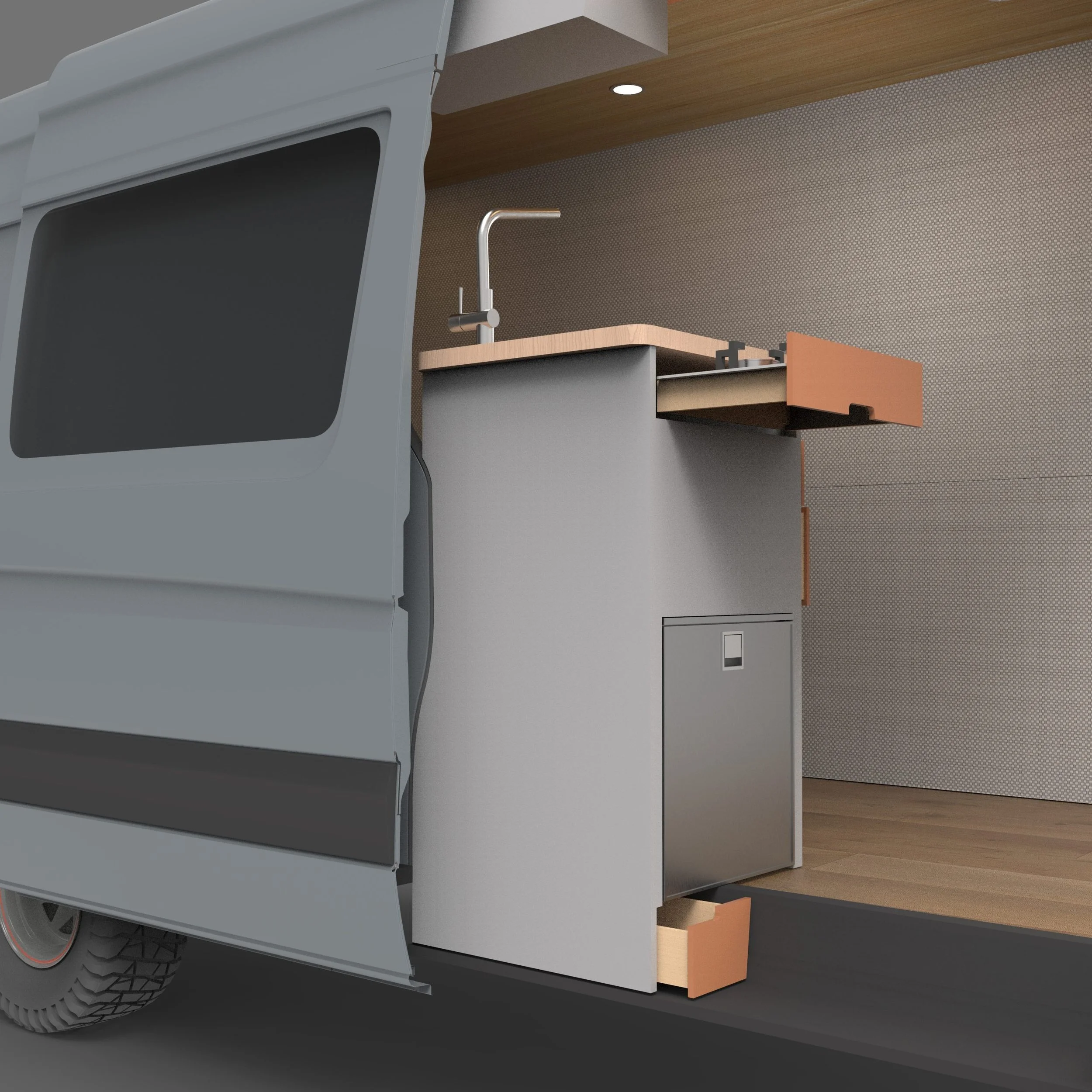 Close-up of a modern van kitchen with a sink, wooden countertops, and a patterned wall behind