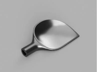 Prototype spoon head on a gray background.