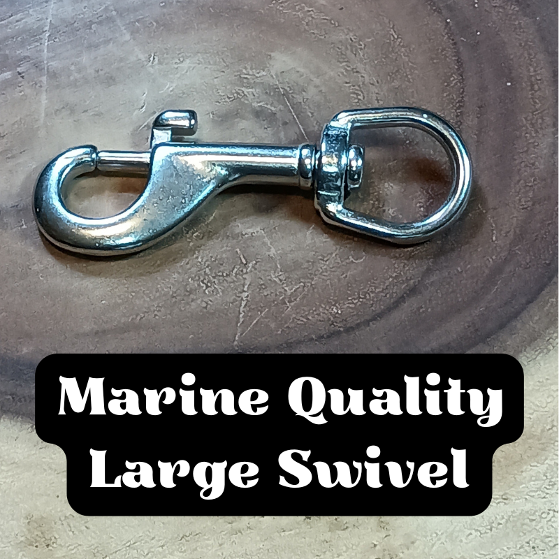 A large metal swivel hook lying on a wooden surface with text overlay reading 'Marine Quality Large Swivel'.