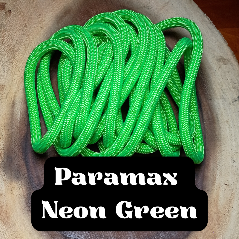 A pile of bright neon green Paramax shoelaces with a black label that reads "Paramax Neon Green" in white text.
