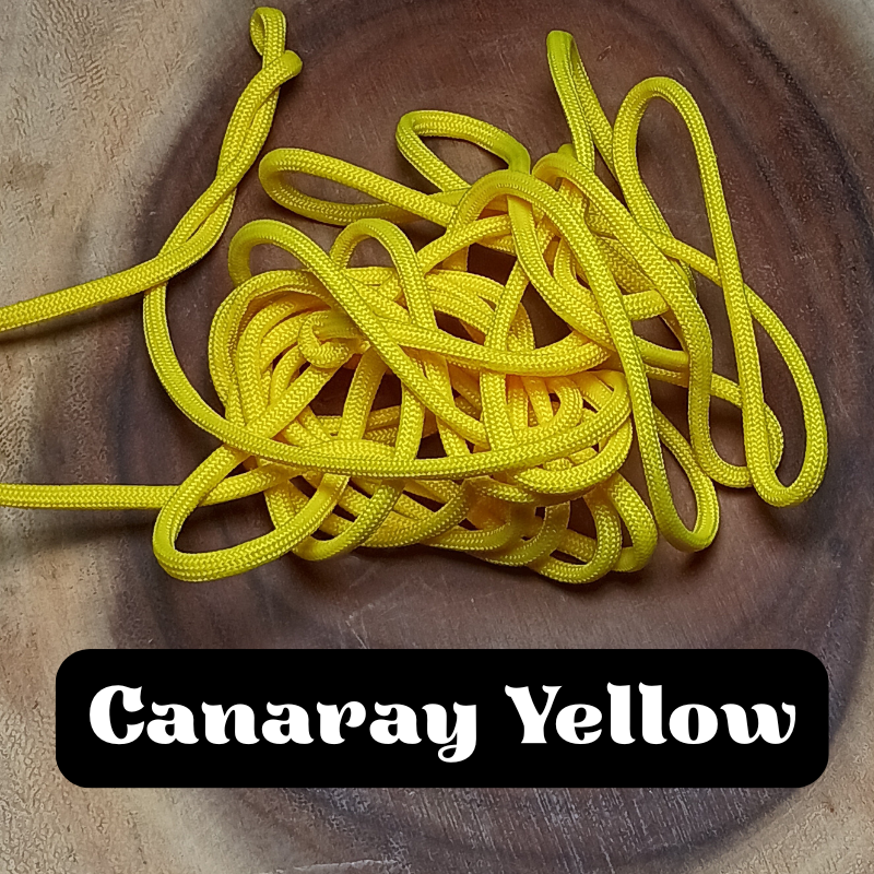 A tangled yellow 550 paracord display that reads 'Canaray Yellow'.