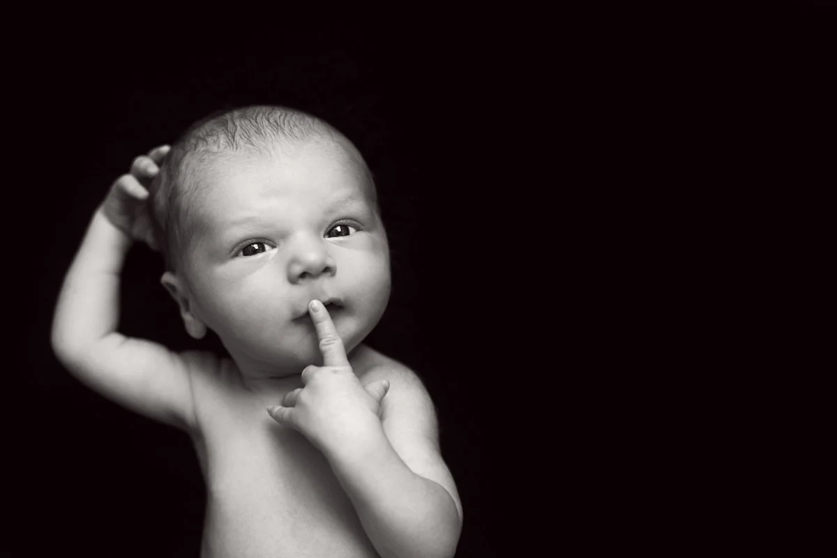 Studio-style newborn portrait of a baby photographed in Bromley by Kate See Photography.