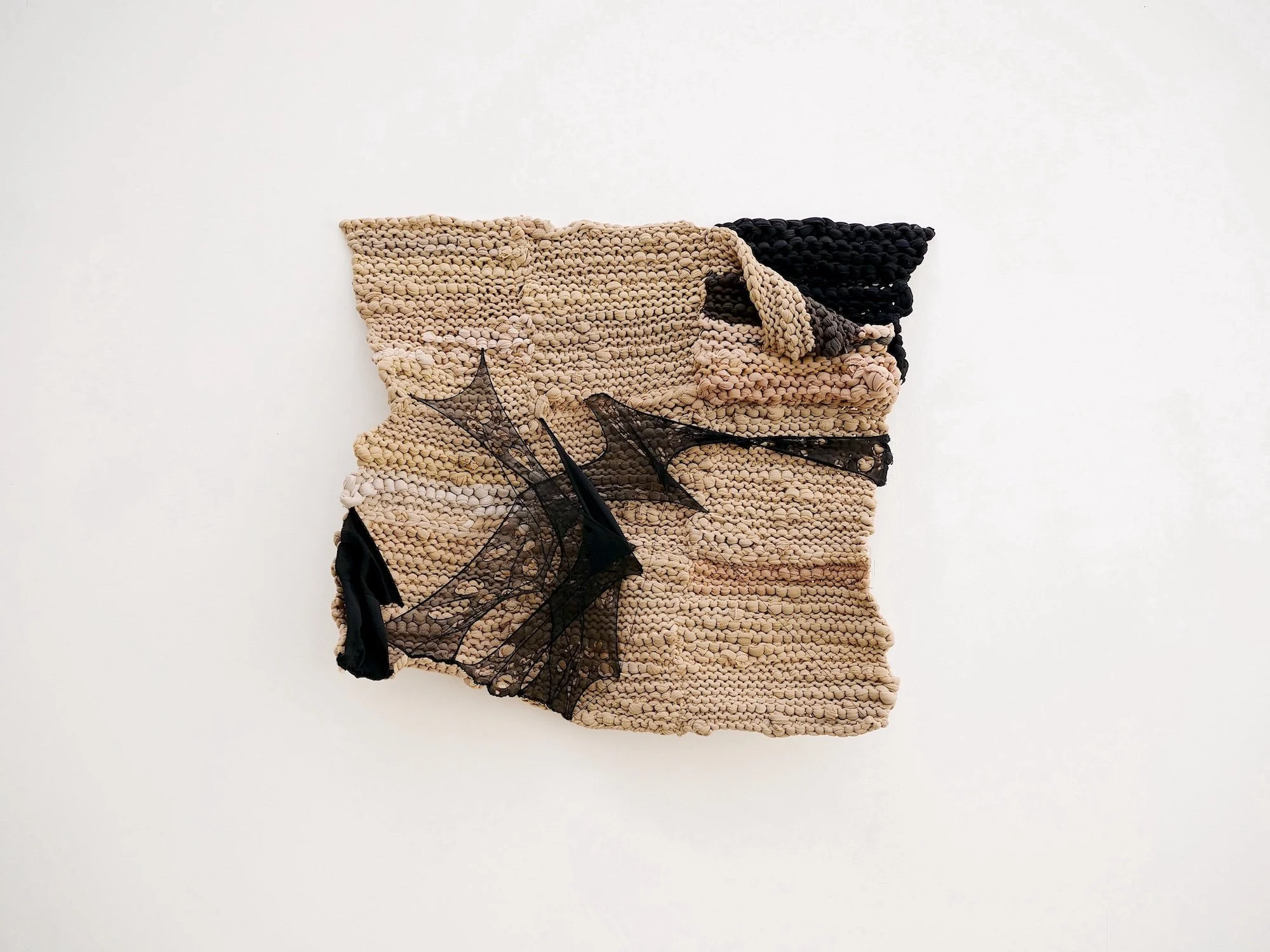 What Lies Beneath - Empire's dark history revealed, 2021, 60 x 63cm, used tights, bamboo/cotton yarn, cotton thread and recycled PET thread