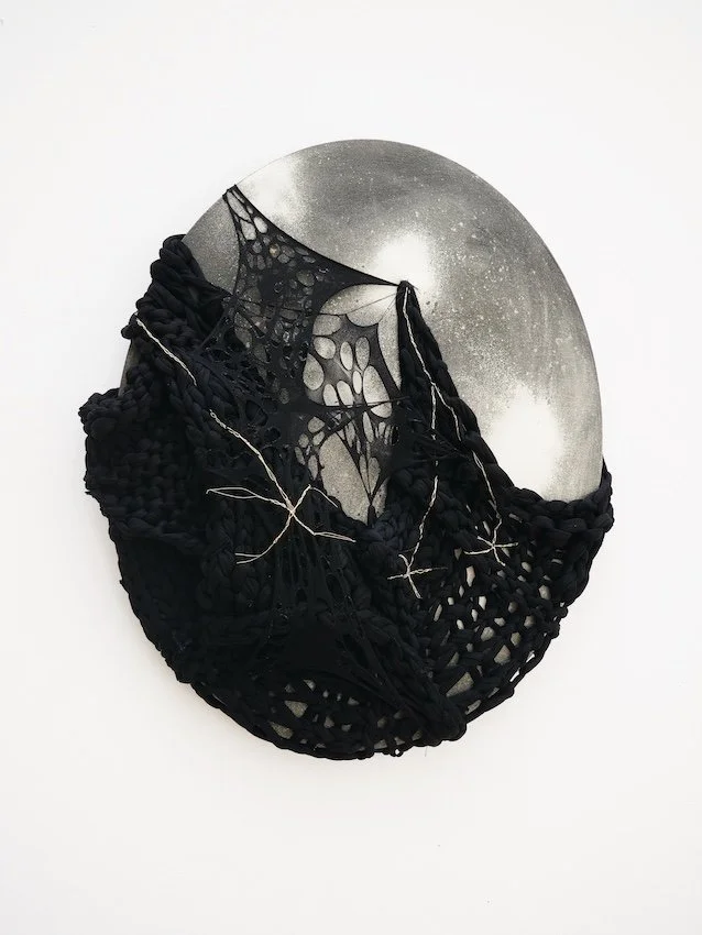 Luminous Black Matter II, 2024
42 x 51.5 x 1.75cm
eco-friendly water-based acrylic paint, 24ct gold powder, 12ct gold powder, nylon tights, recycled PET thread, cowrie shells and cotton canvas 