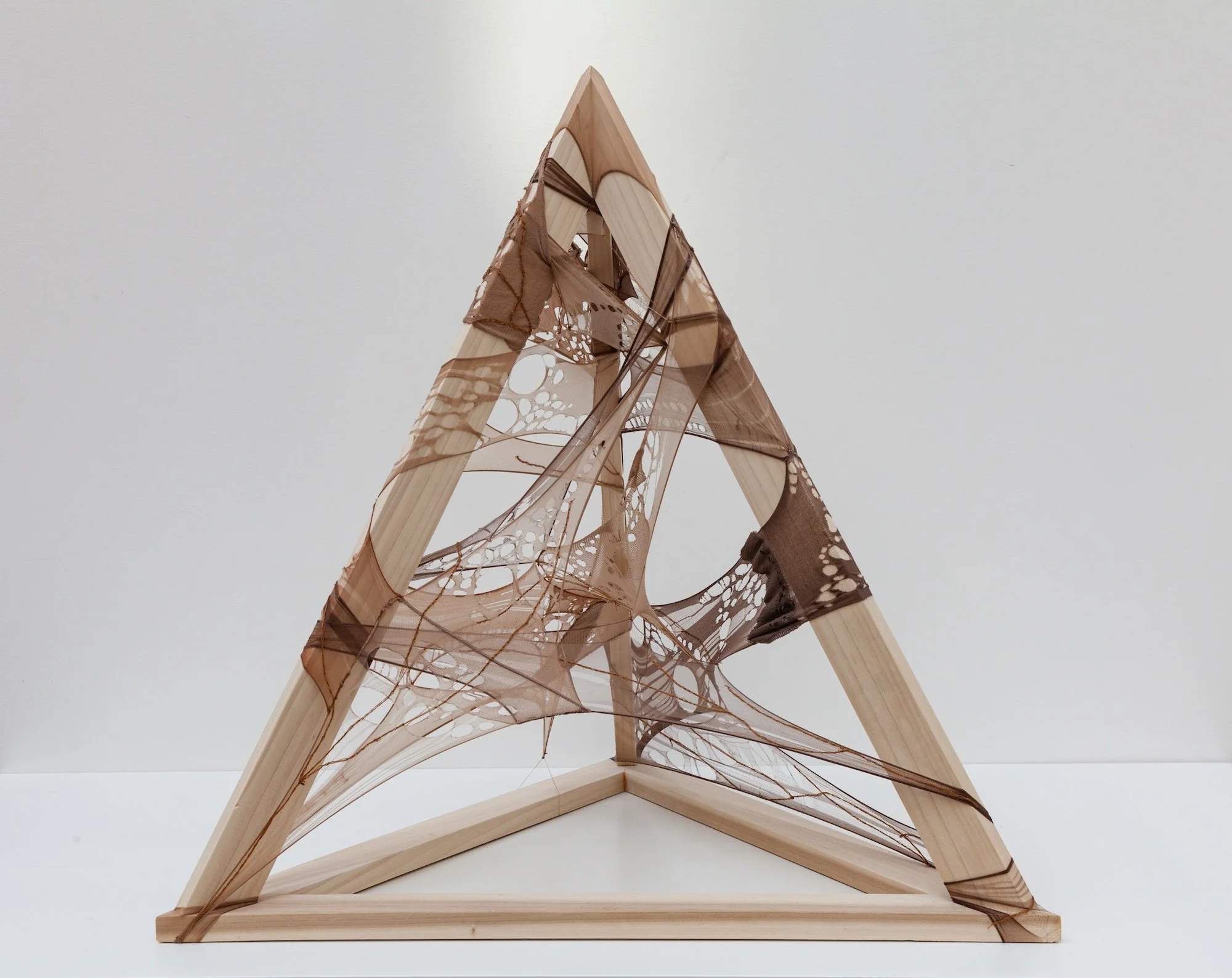 The Ascension of the Nude, 2021, 59.8 x 59.8  x 62.5cm, used burnout tights, cotton thread on handmade tulip wood pyramid frame