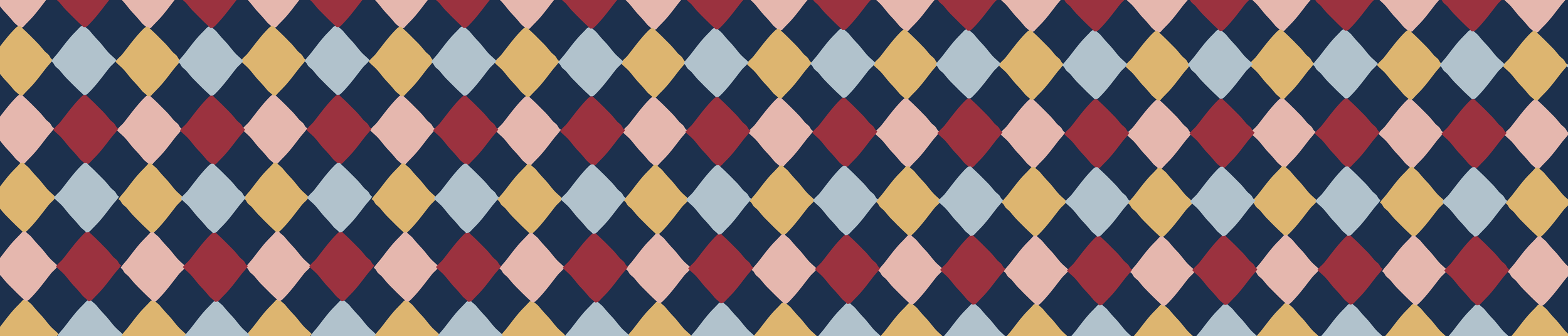 Pattern of interlocking diamonds in navy blue, pale blue, beige, red, and pink colors.