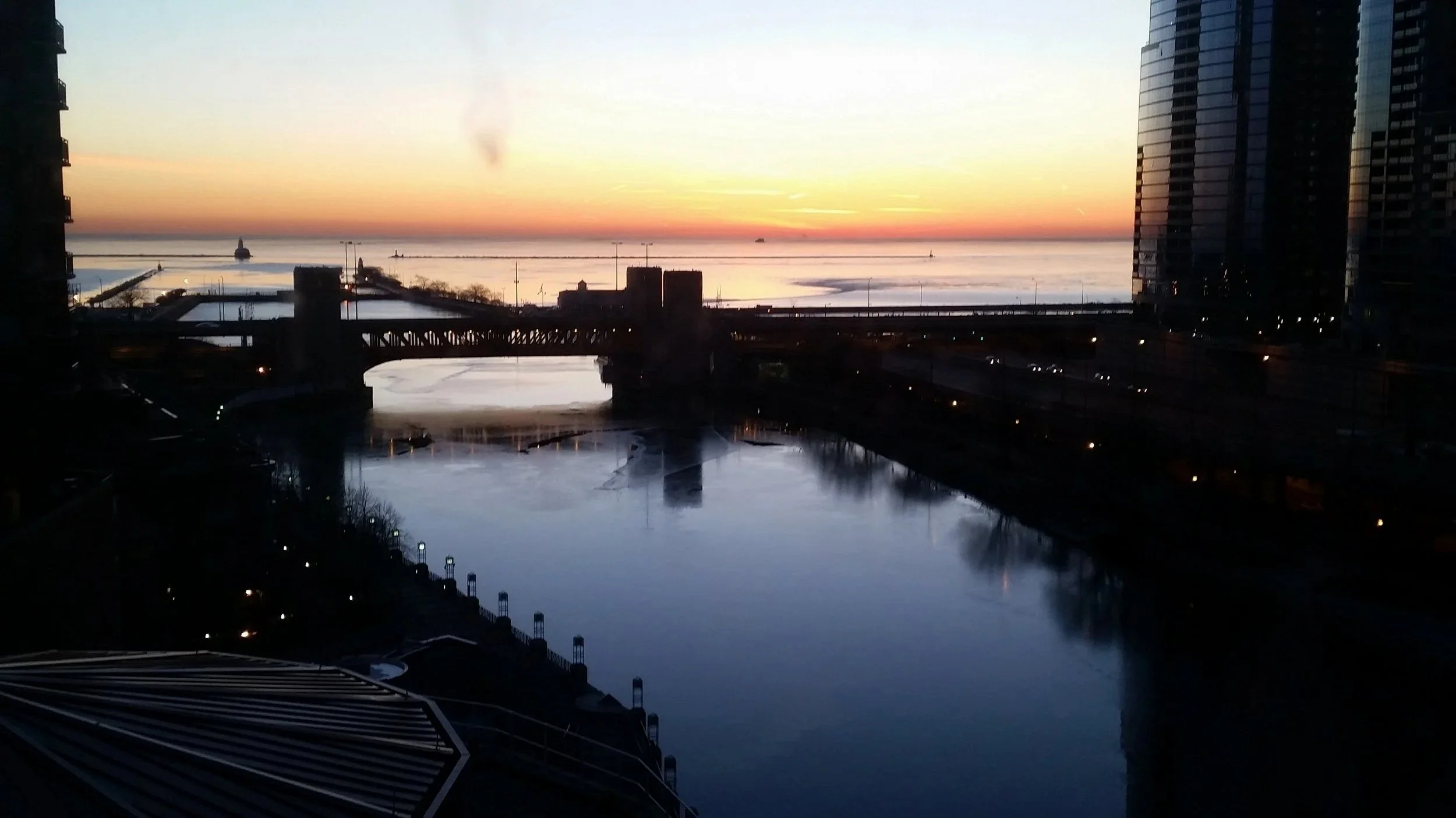 Morning sunrise in downtown Chicago.  Check out the Chicago River and Lake Michigan
