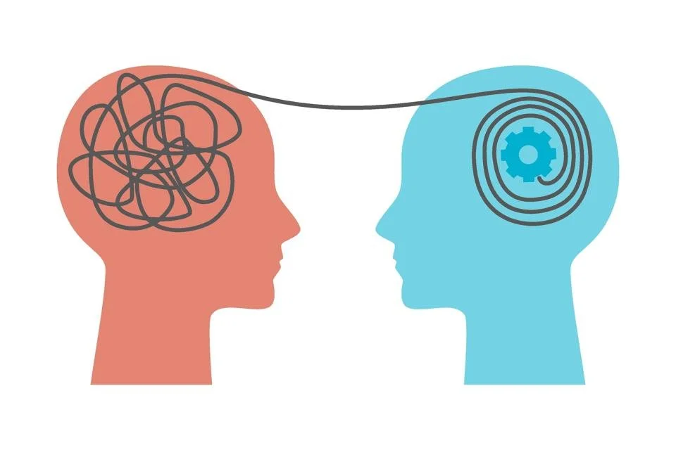 two heads with spool of thread shared between them.