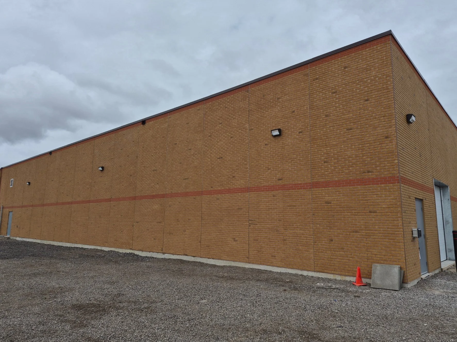 Large brick building after colour correction