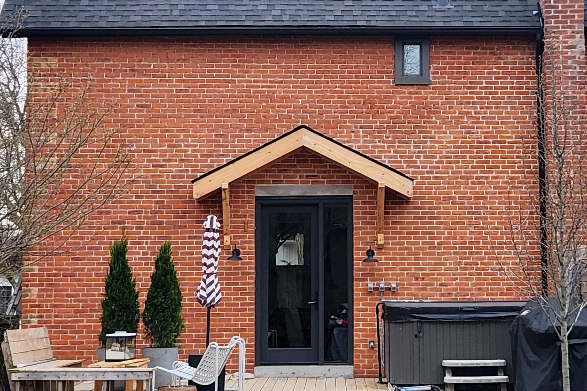 Red brick entrance with colour-matched masonry