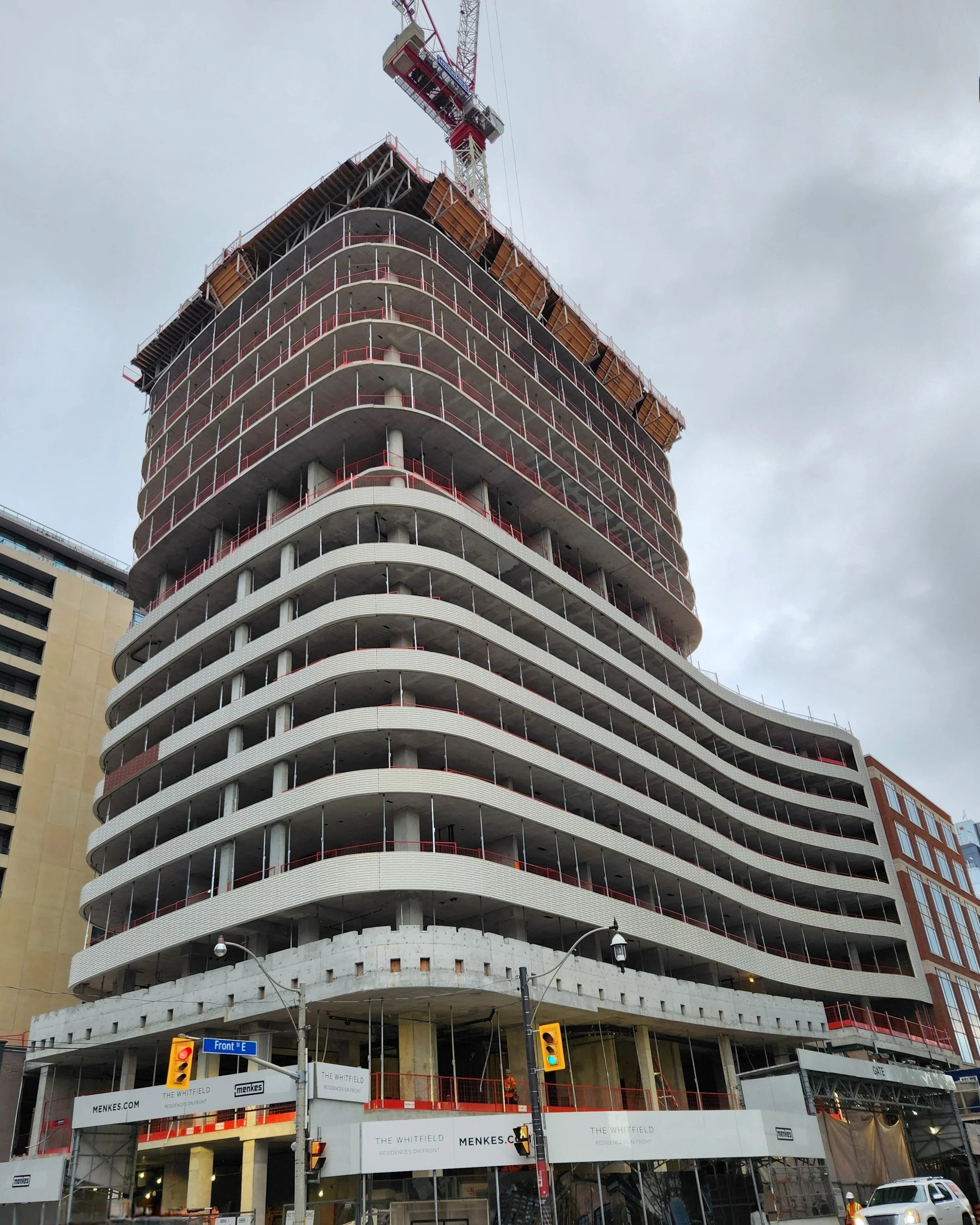 High-rise building exterior before masonry colour work