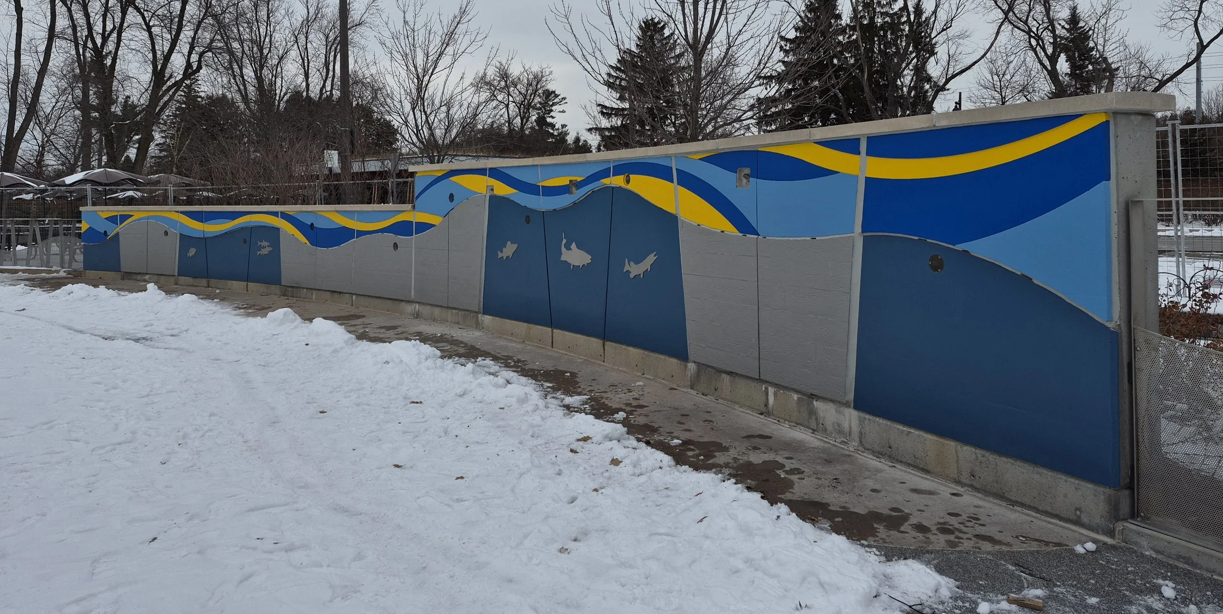 Concrete retaining wall after colour staining