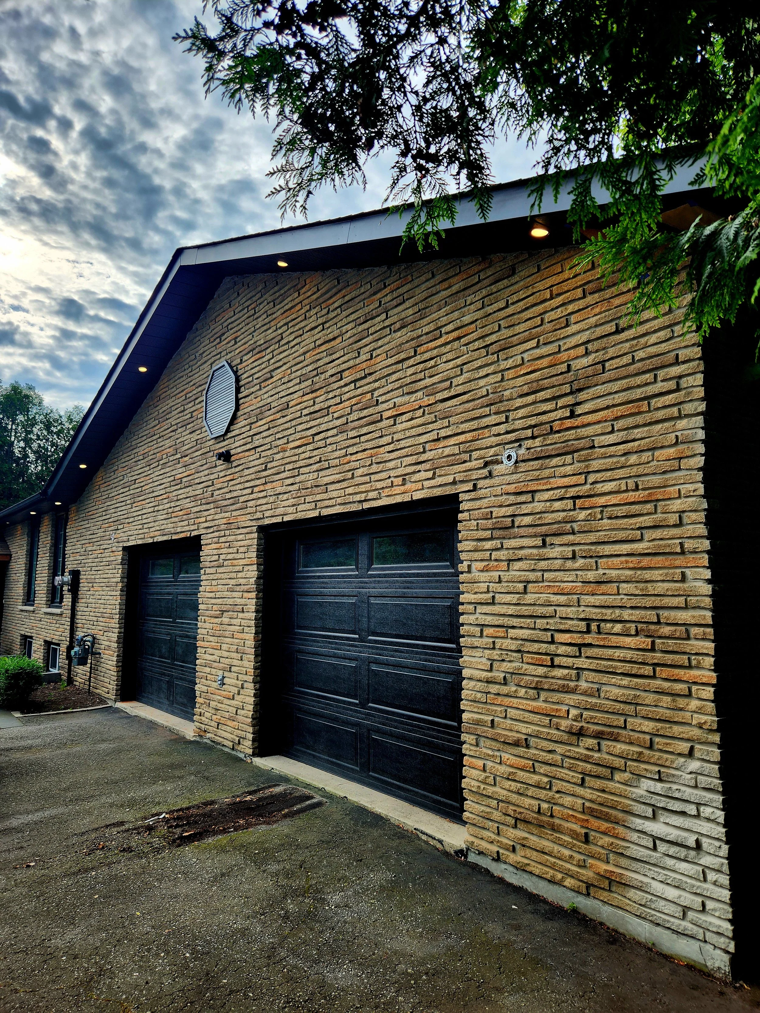 Dark brick house exterior before colour staining
