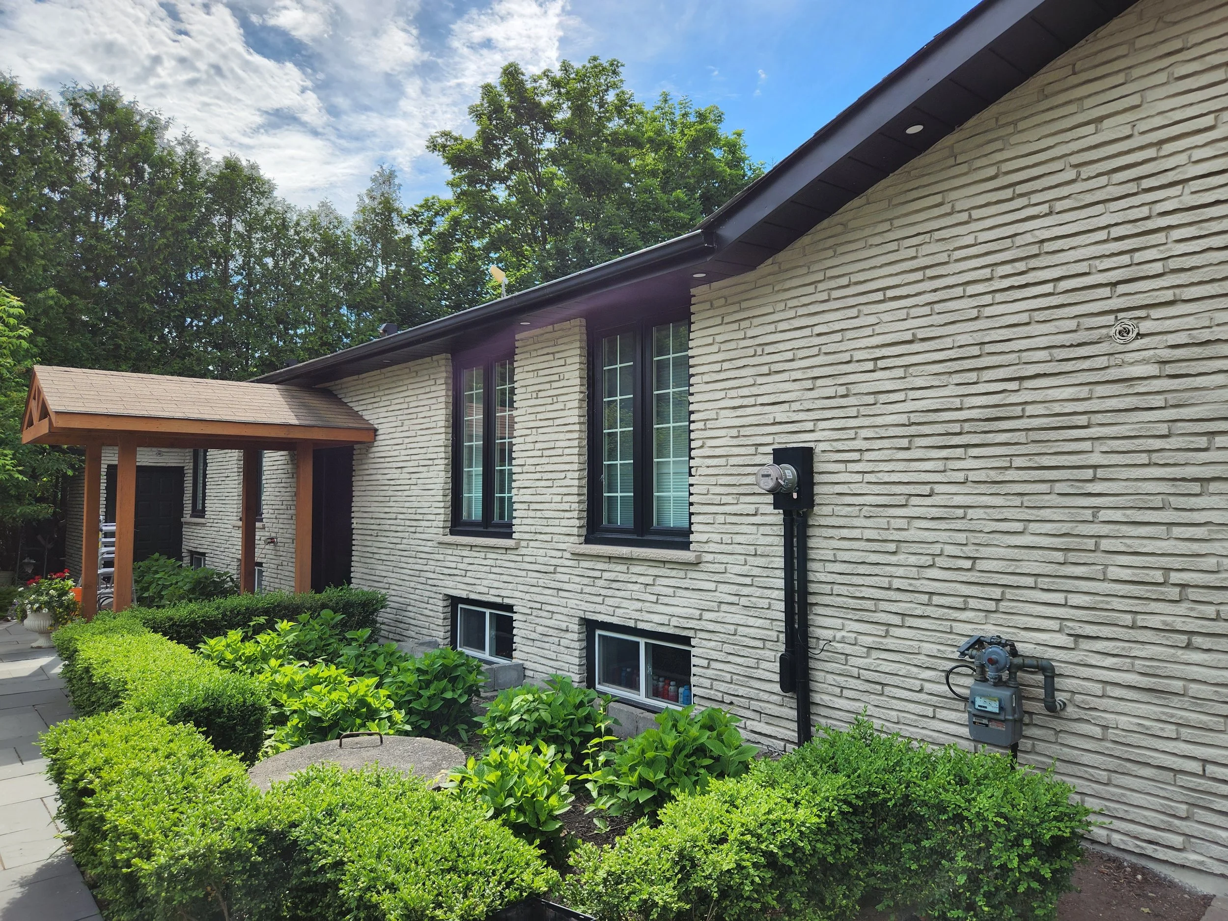 Light brick home exterior after colour update