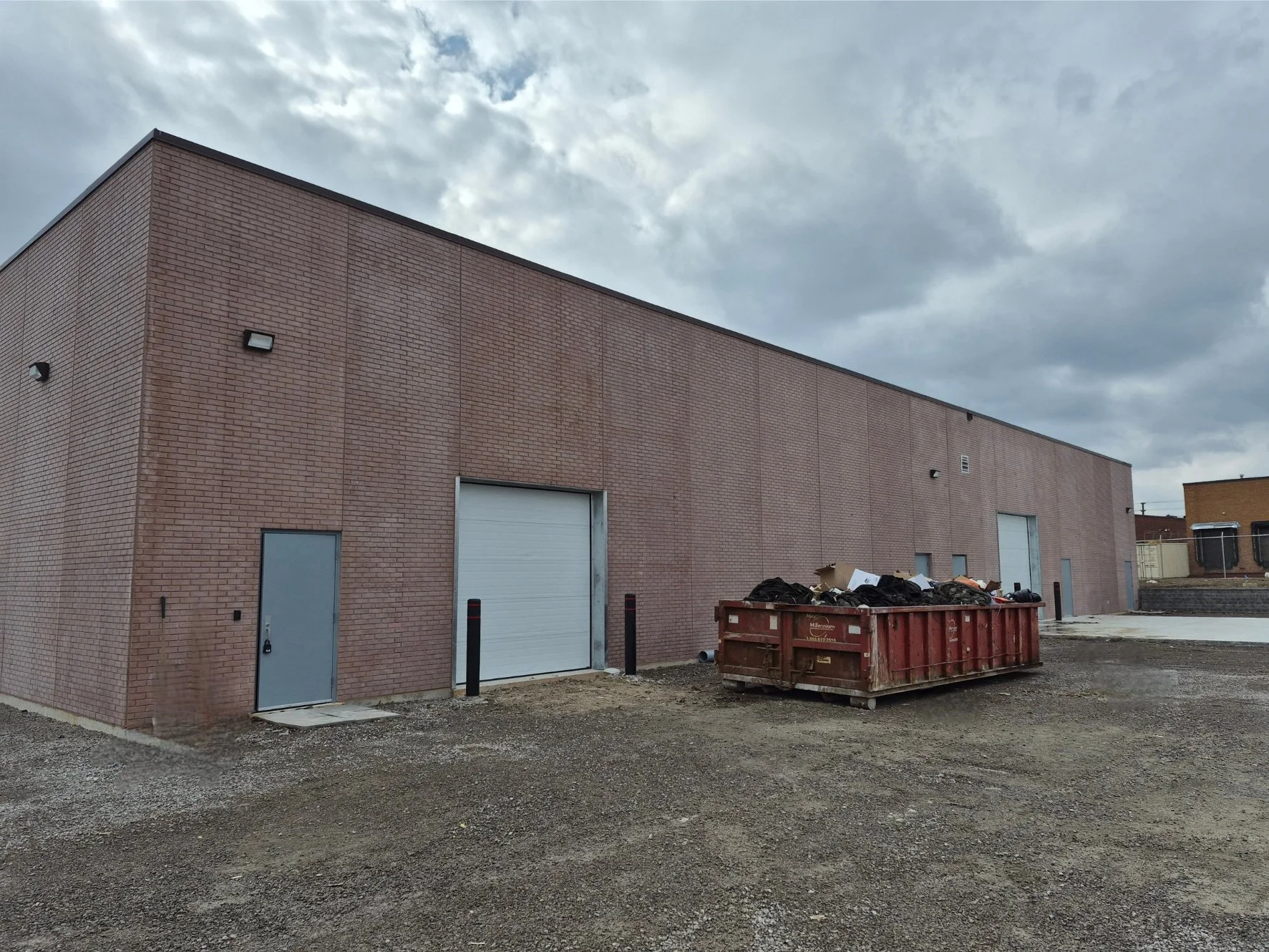Large brick building before colour correction