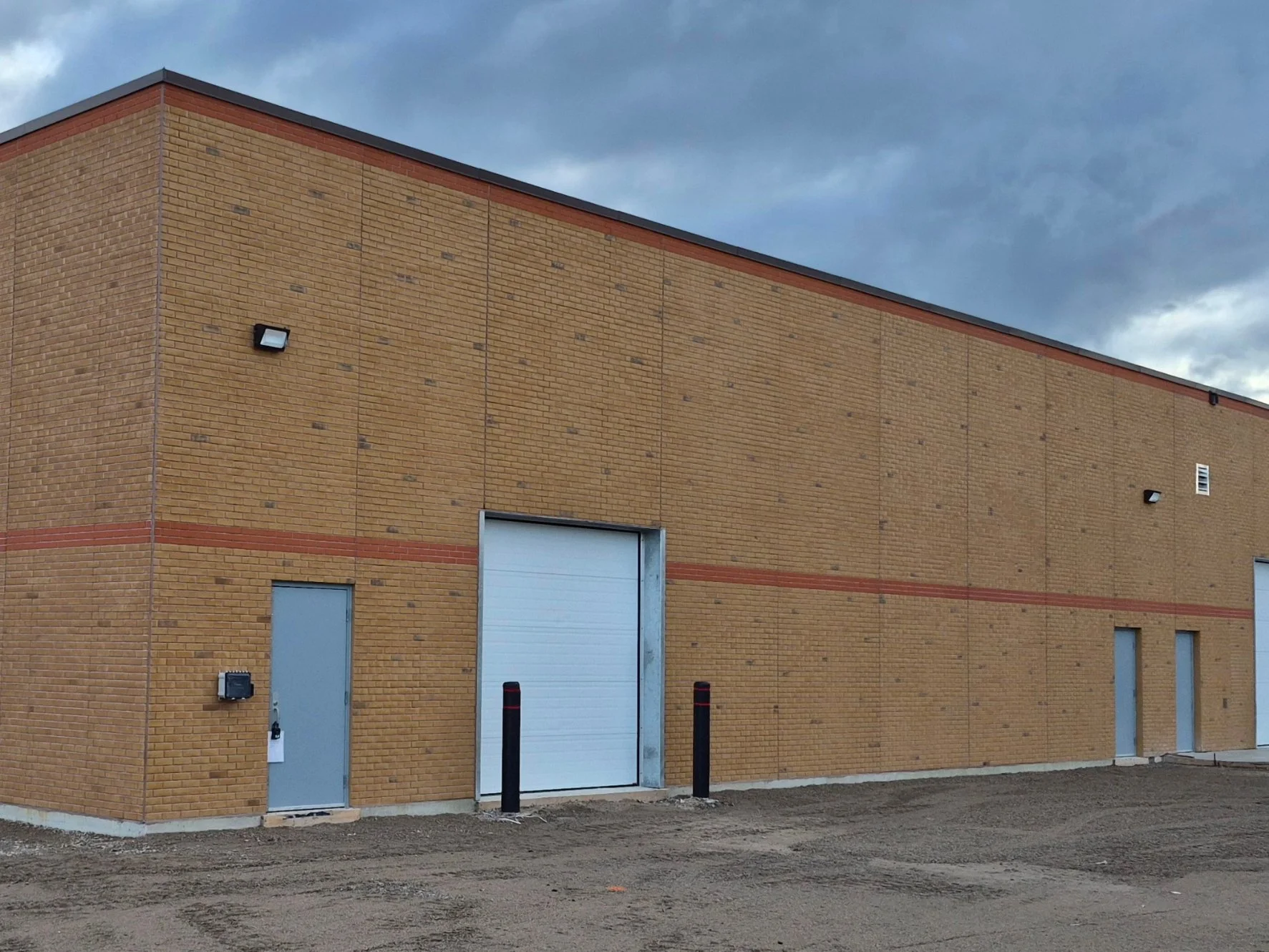 Large brick building after colour correction
