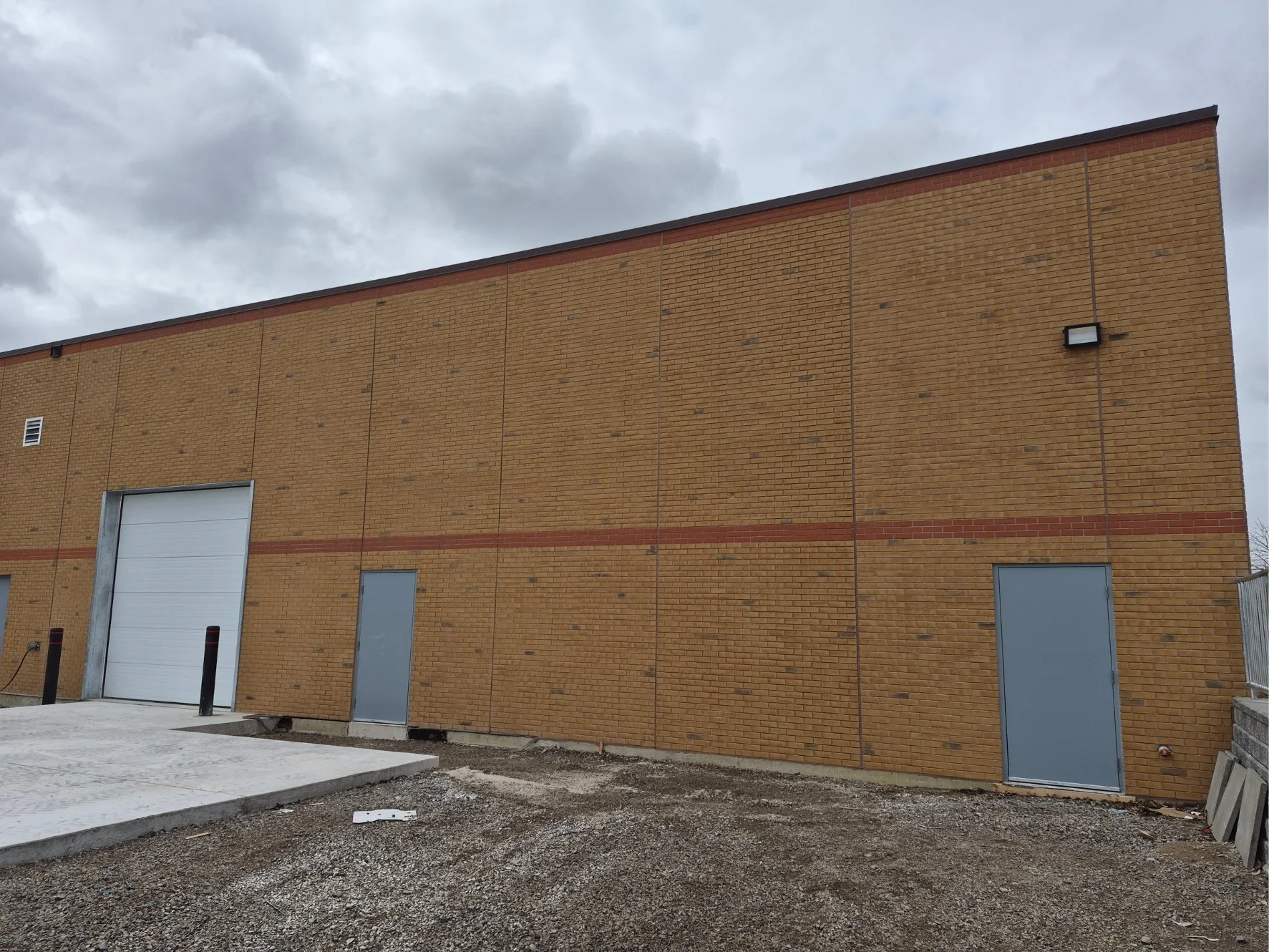 Large brick building after colour correction