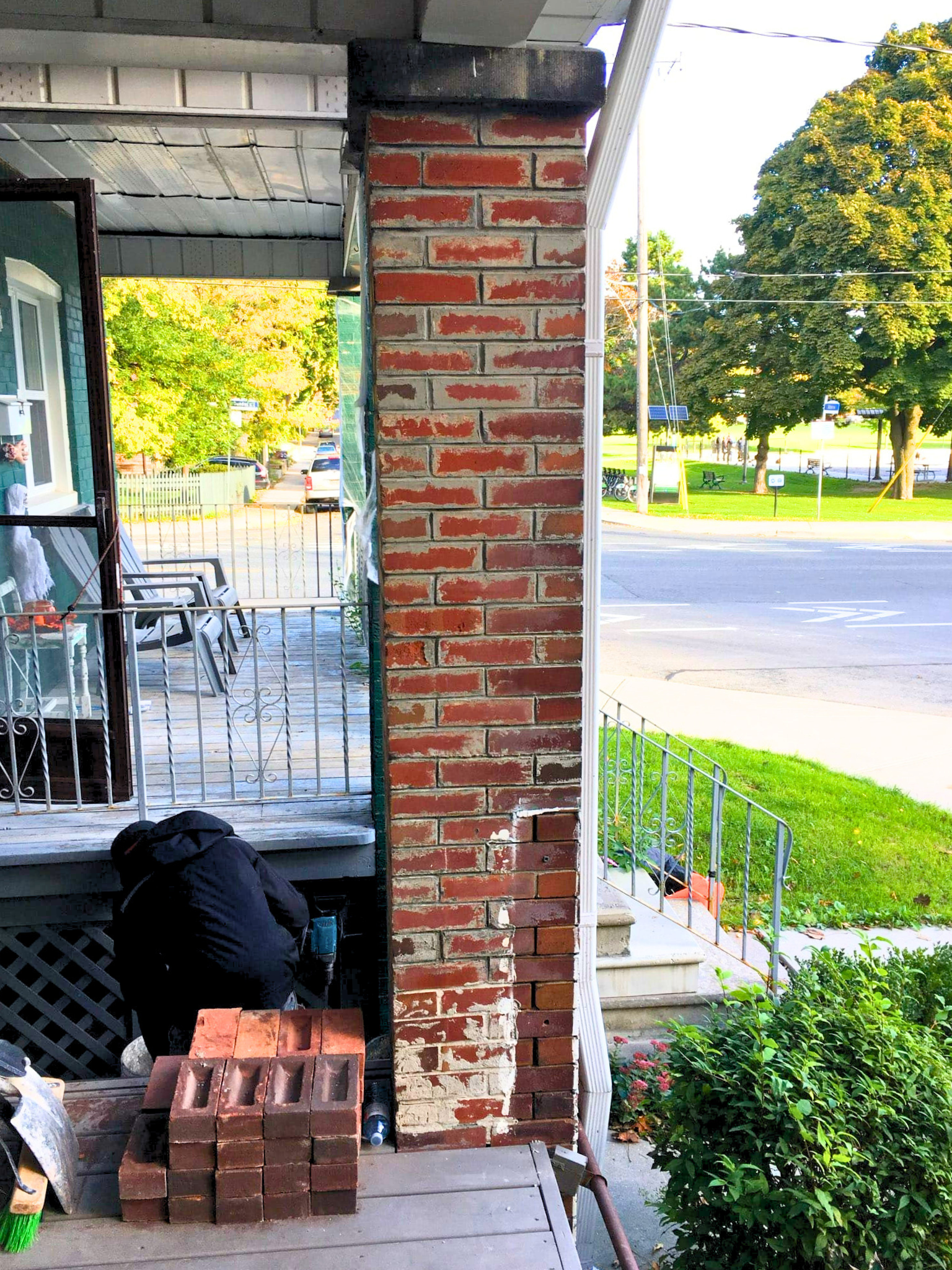 Brick column before and after repair and restoration