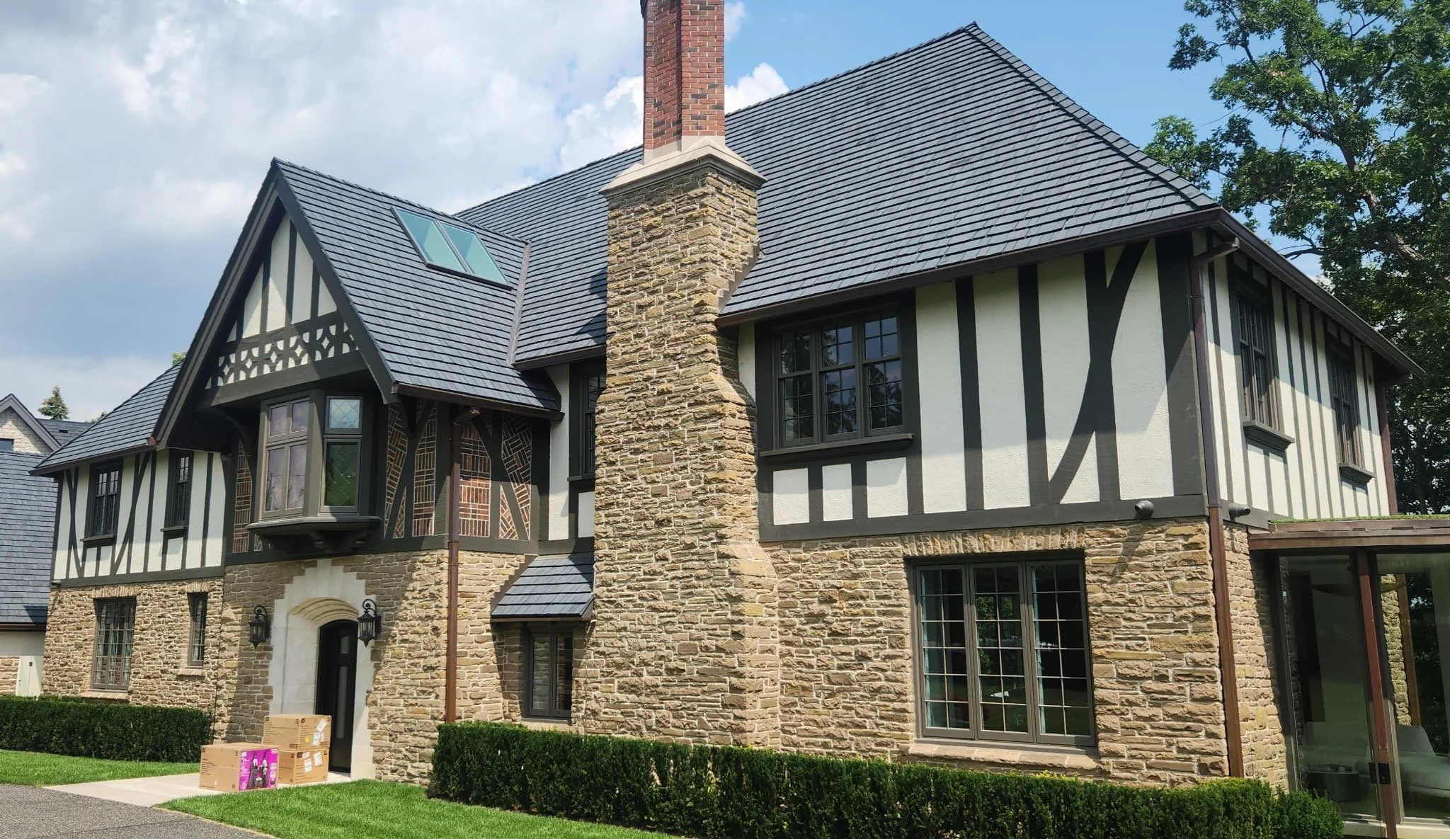 Tudor-style home with semi-transparent masonry stain