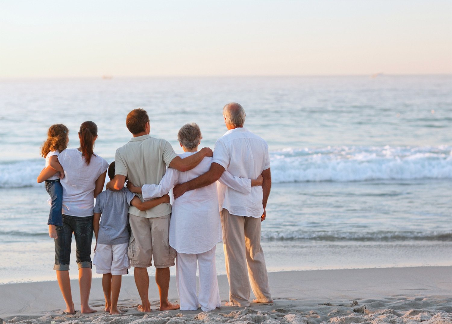 Family on beach after funeral memorial service offered in Northern California for eco cremation