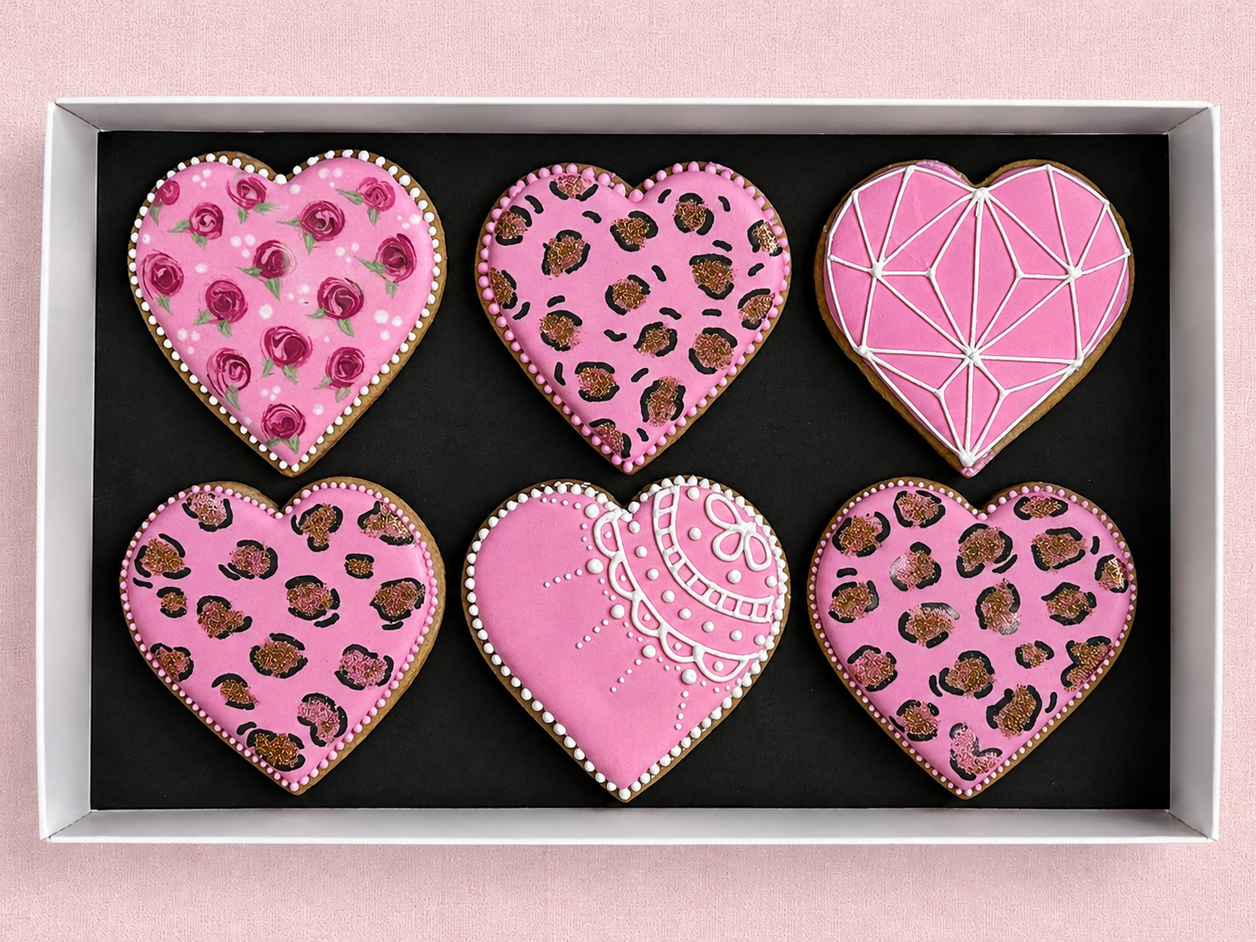 Cookie Cupid Valentine hearts iced biscuit gift boxes are the perfect present for someone hard to buy for on Valentines Day or for celebrations who doesn't drink wine or alcohol or want flowers. Give them iced biscuits instead