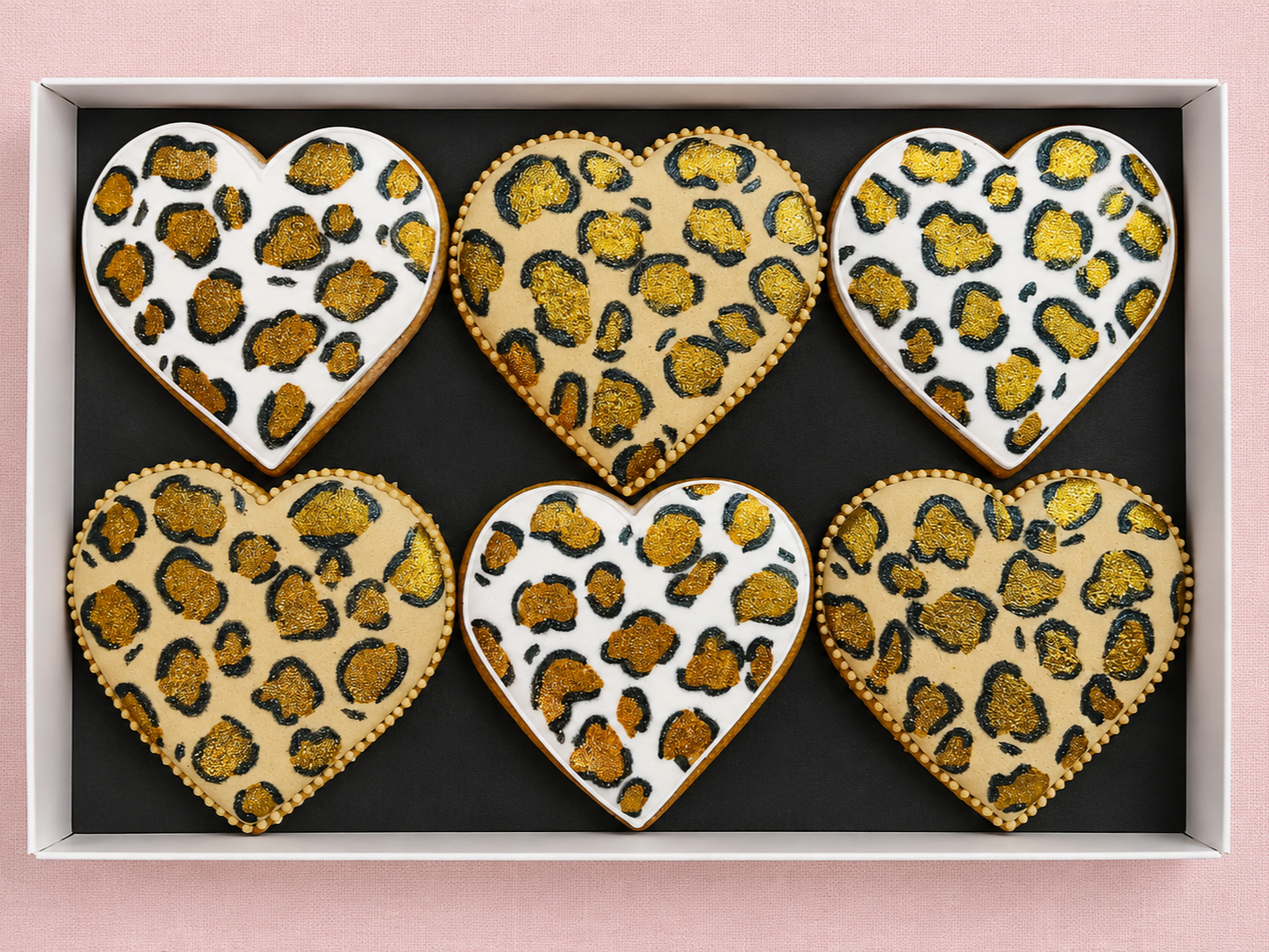 Cookie Cupid makes custom iced biscuits and biscuit gift boxes in Oxfordshire for delivery across the UK. Also biscuit icing workshops