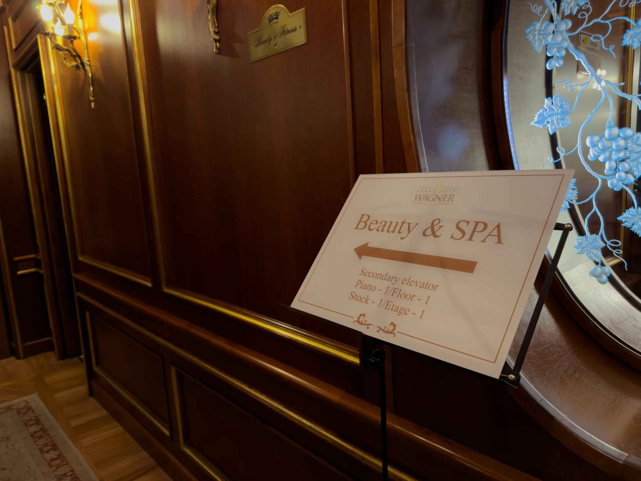 Sign directing guests to the Beauty & Spa area at Grand Hotel Wagner in Palermo.