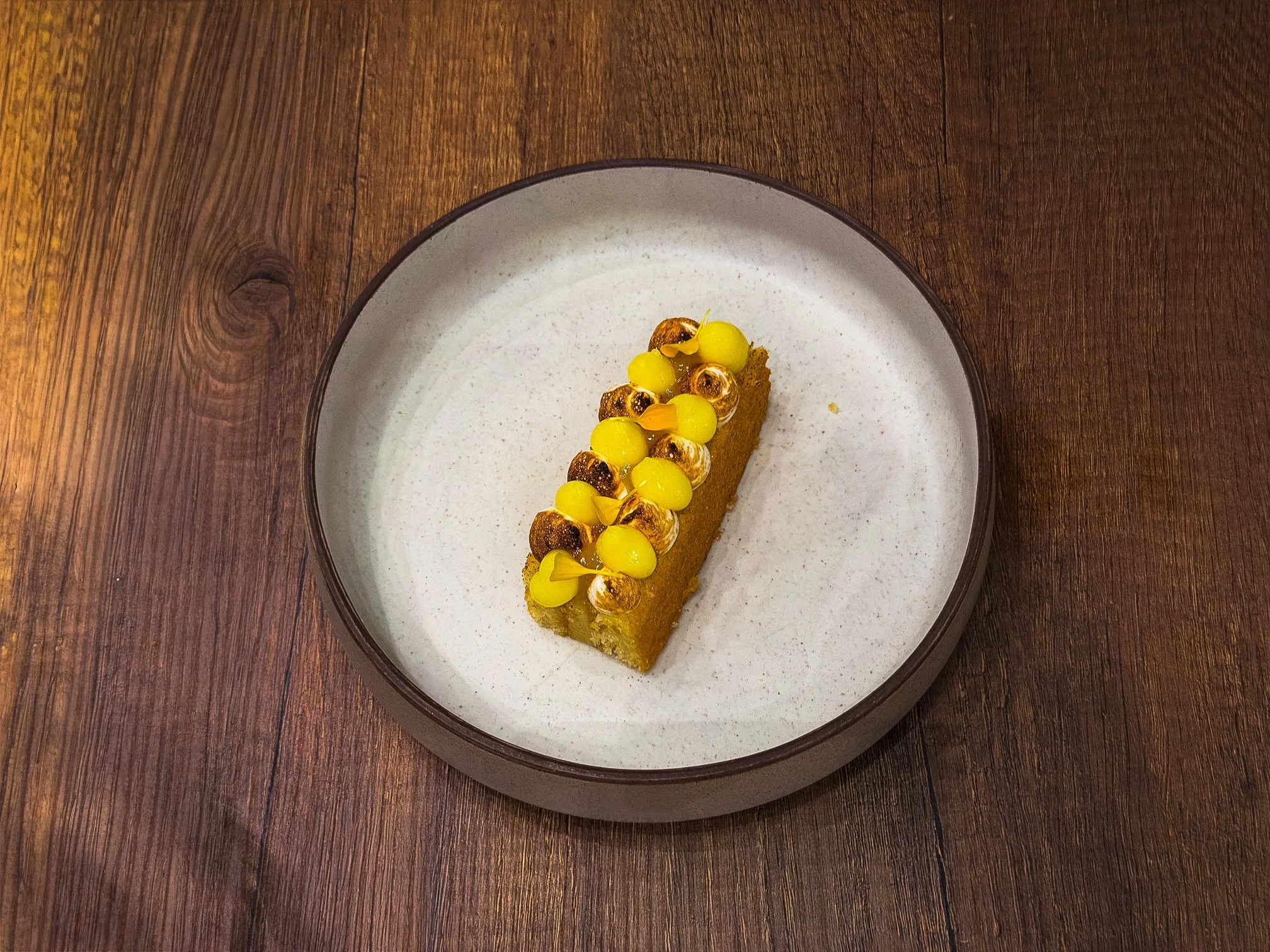 La nostra torta at ALI3I in Palermo, a lemon and almond cake finished with bright lemon elements and torched meringue.