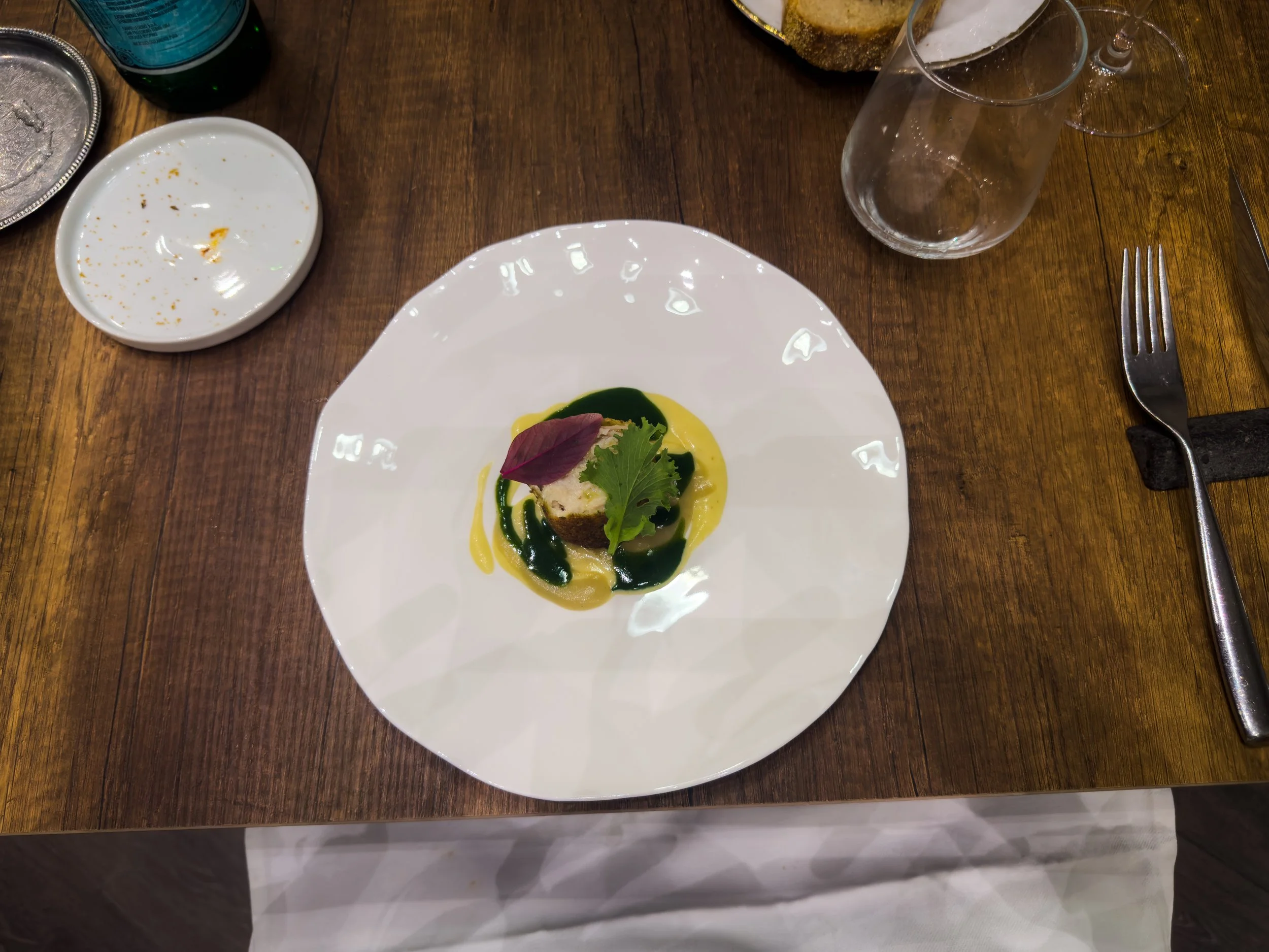 Pesce azzurro at ALI3I in Palermo, served with crispy bread, smoked aubergine, yellow datterino tomatoes and mint.