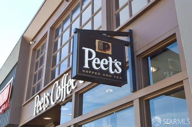 Peet's Coffee and Tea storefront sign on a building