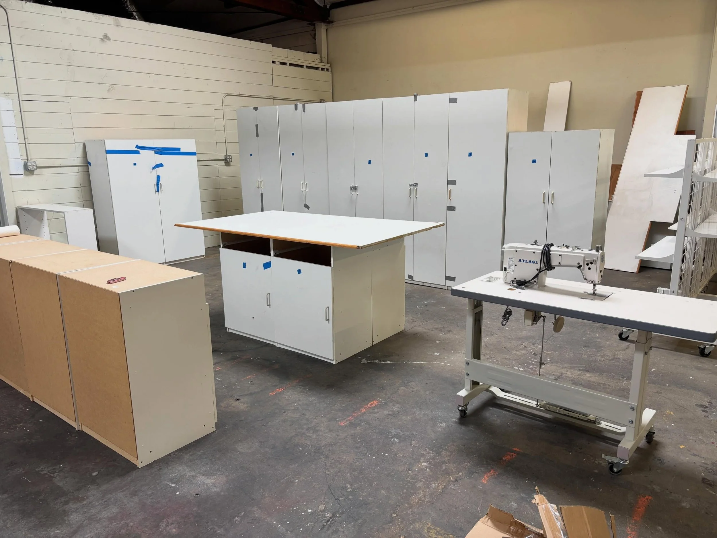 Huge day today is Sewasaurusville.  We removed and picked up an entire quilting studio and brought it to the warehouse. Such a huge difference! I can start to see the workroom coming together. This area will be a member workshop- so if you have neede