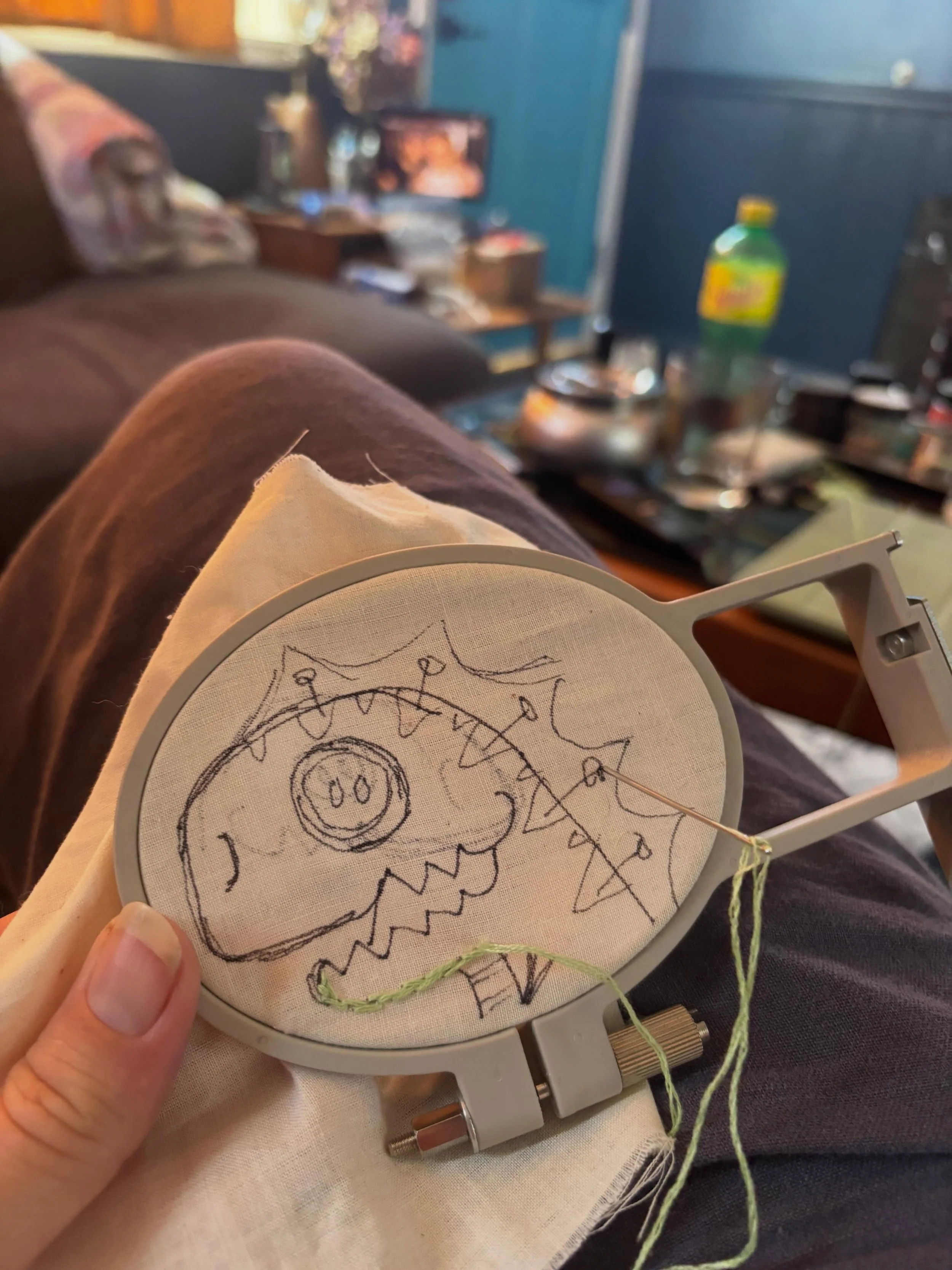 I&rsquo;ve started a project to help me procrastinate and not get anything that I need done. But hey- it&rsquo;s cute and I&rsquo;m having fun. I sketched Rex on some cotton and had to use my embroidery machine hoop, as it was the only hoop of that s