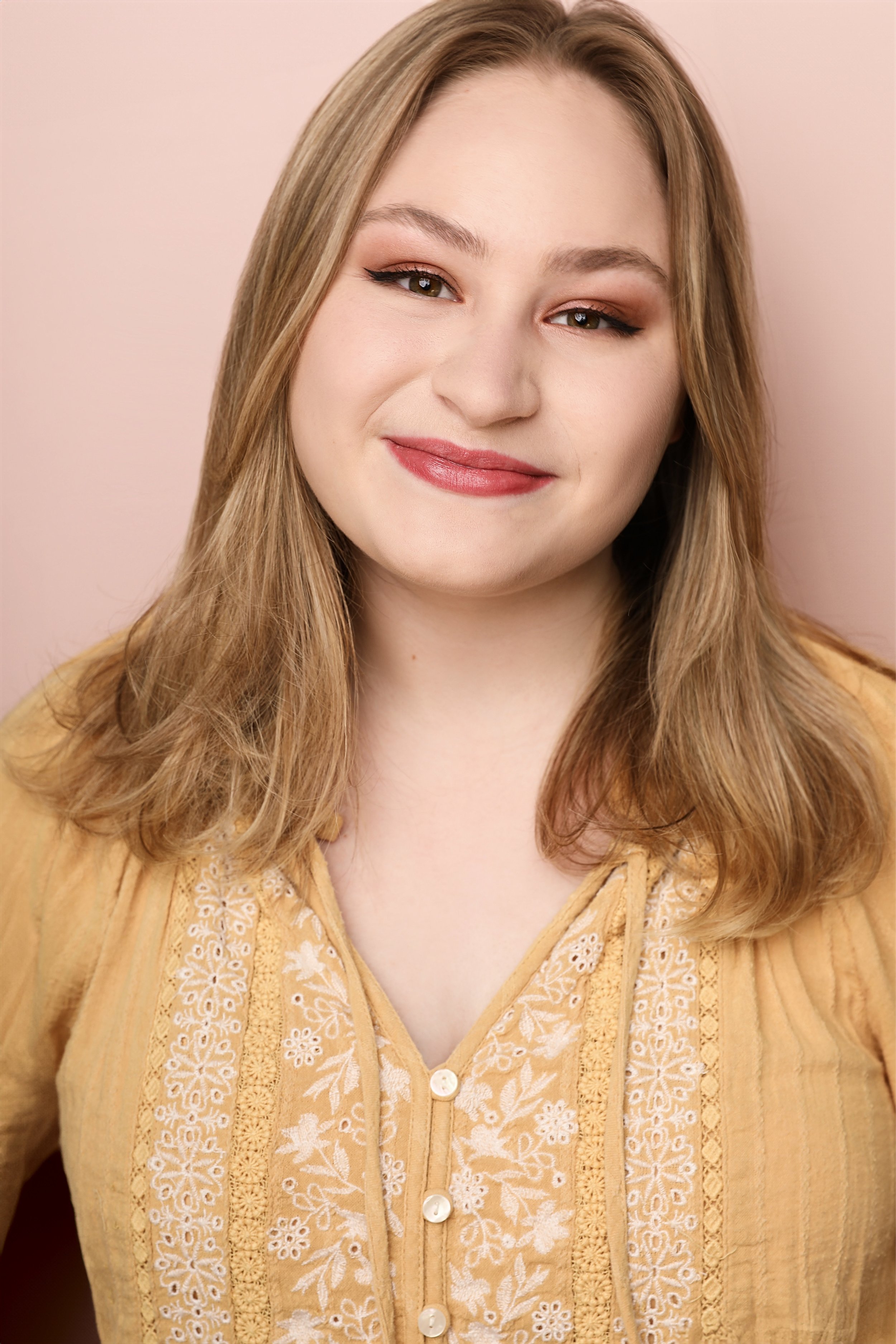 A headshot of Zoe Hollander (she/her), Co-Founding Artistic Director of Make Good Theatre Company.