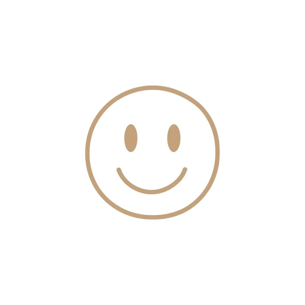 Simple drawing of a smiling face with two oval eyes and a curved mouth.