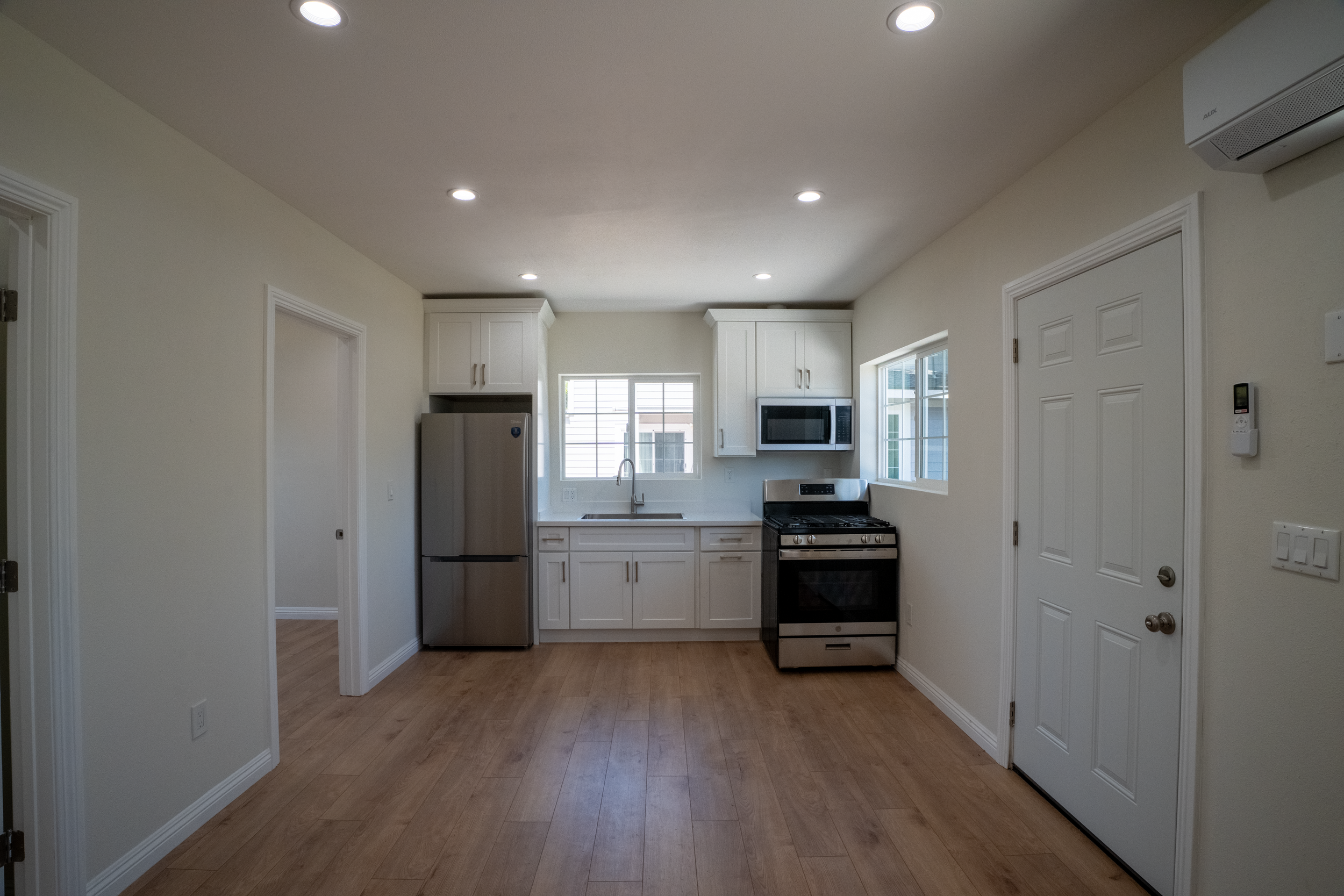 Kitchen with a compact design and new appliances complete for any tenant. 