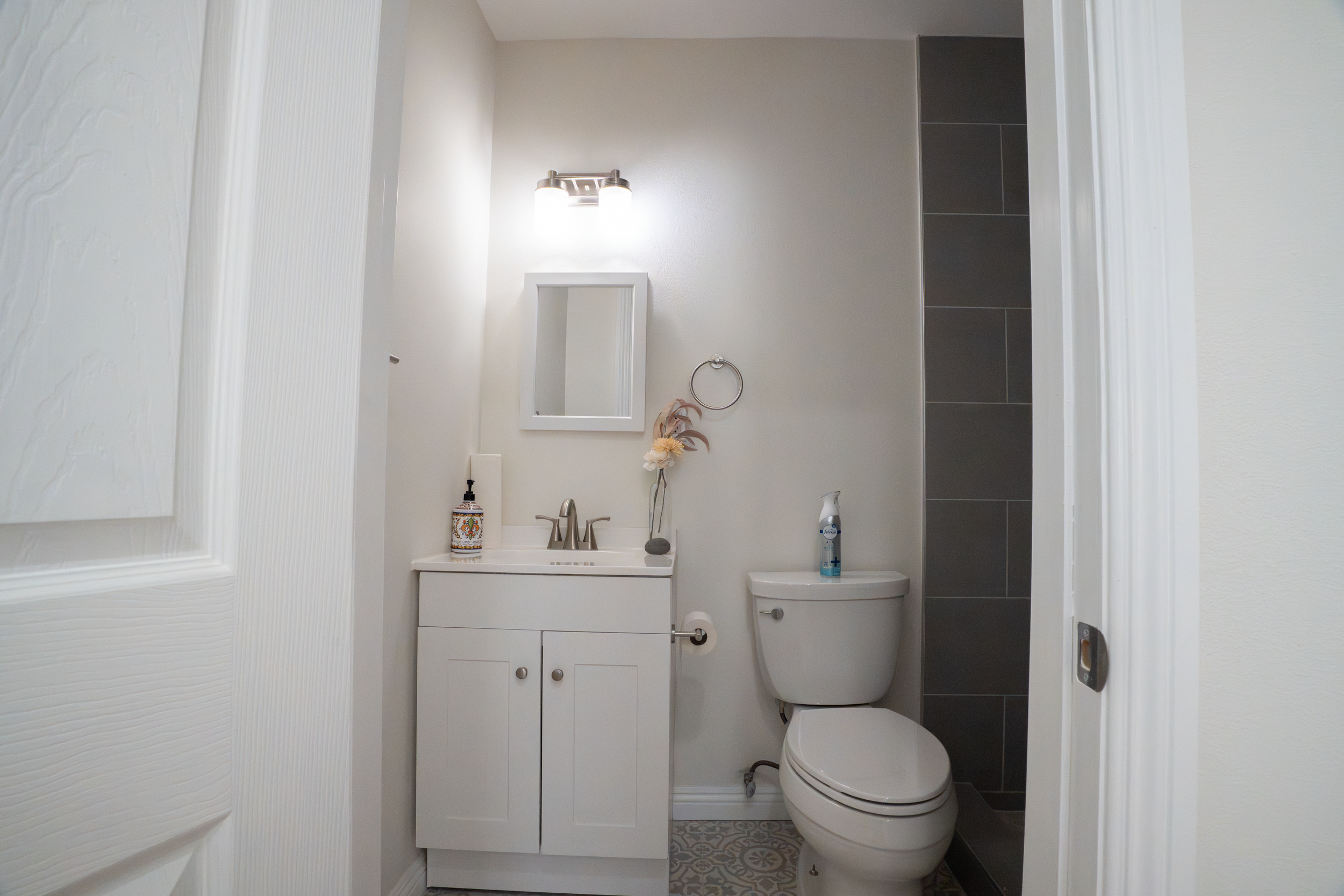 Bathroom complete with a shower on the right side.