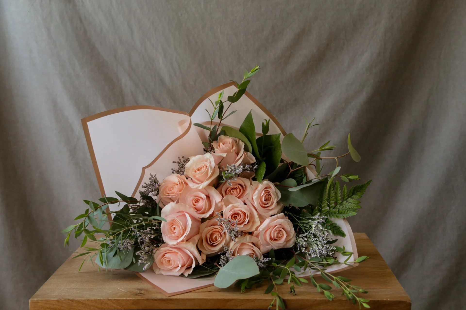 flowers-in-the-city-dozen-roses-pink.jpg