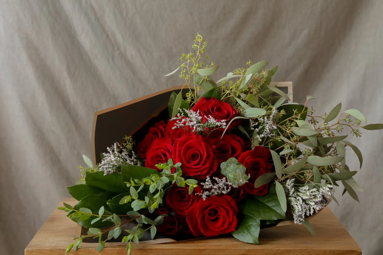 flowers-in-the-city-dozen-roses-red-limonium.jpg