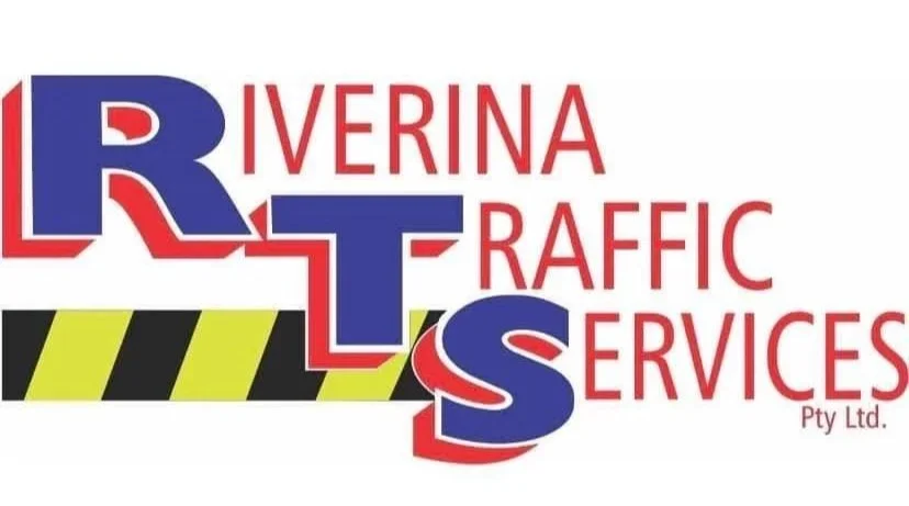 Logo for Riverina Traffic Services Pty Ltd with large stylized letters R, T, and S in blue and red, and a black and yellow striped safety barrier underneath.