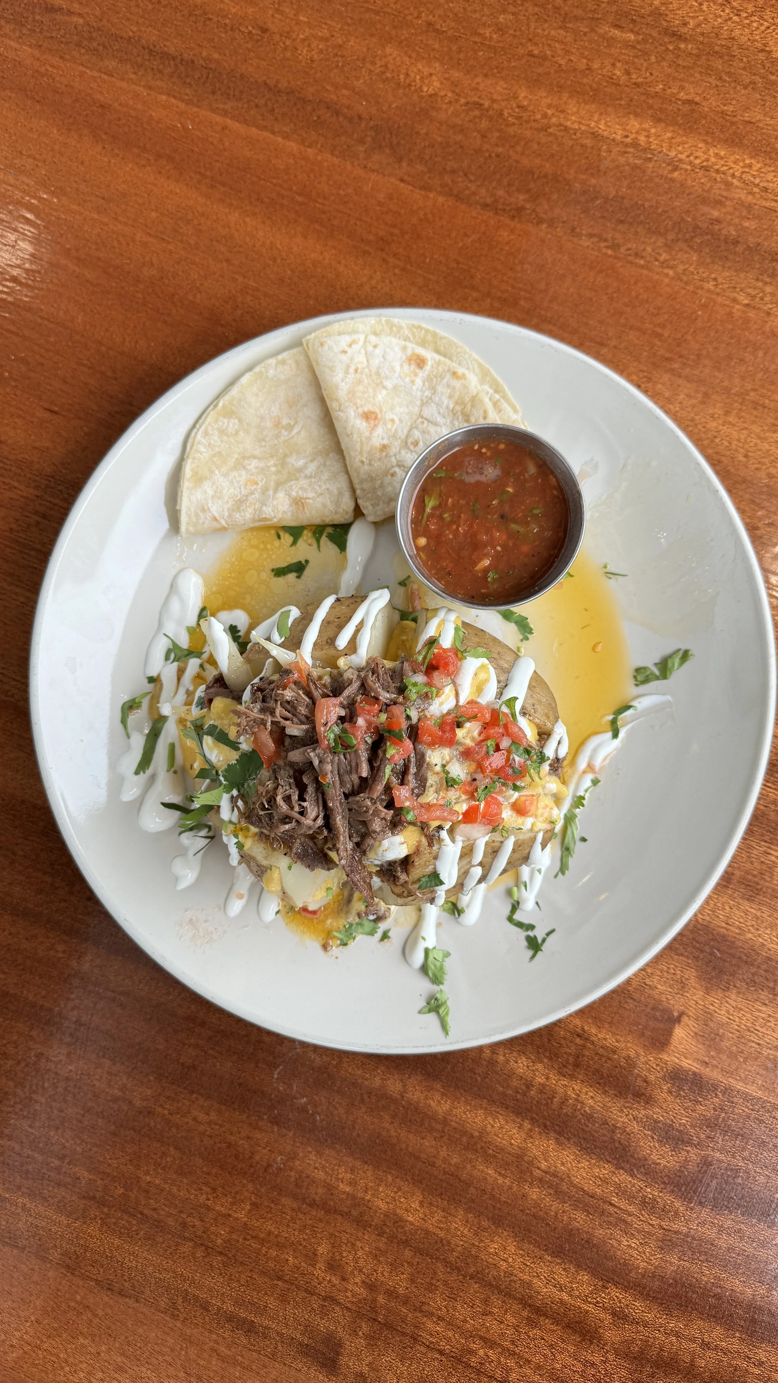 plated special meal with tortilla on the side