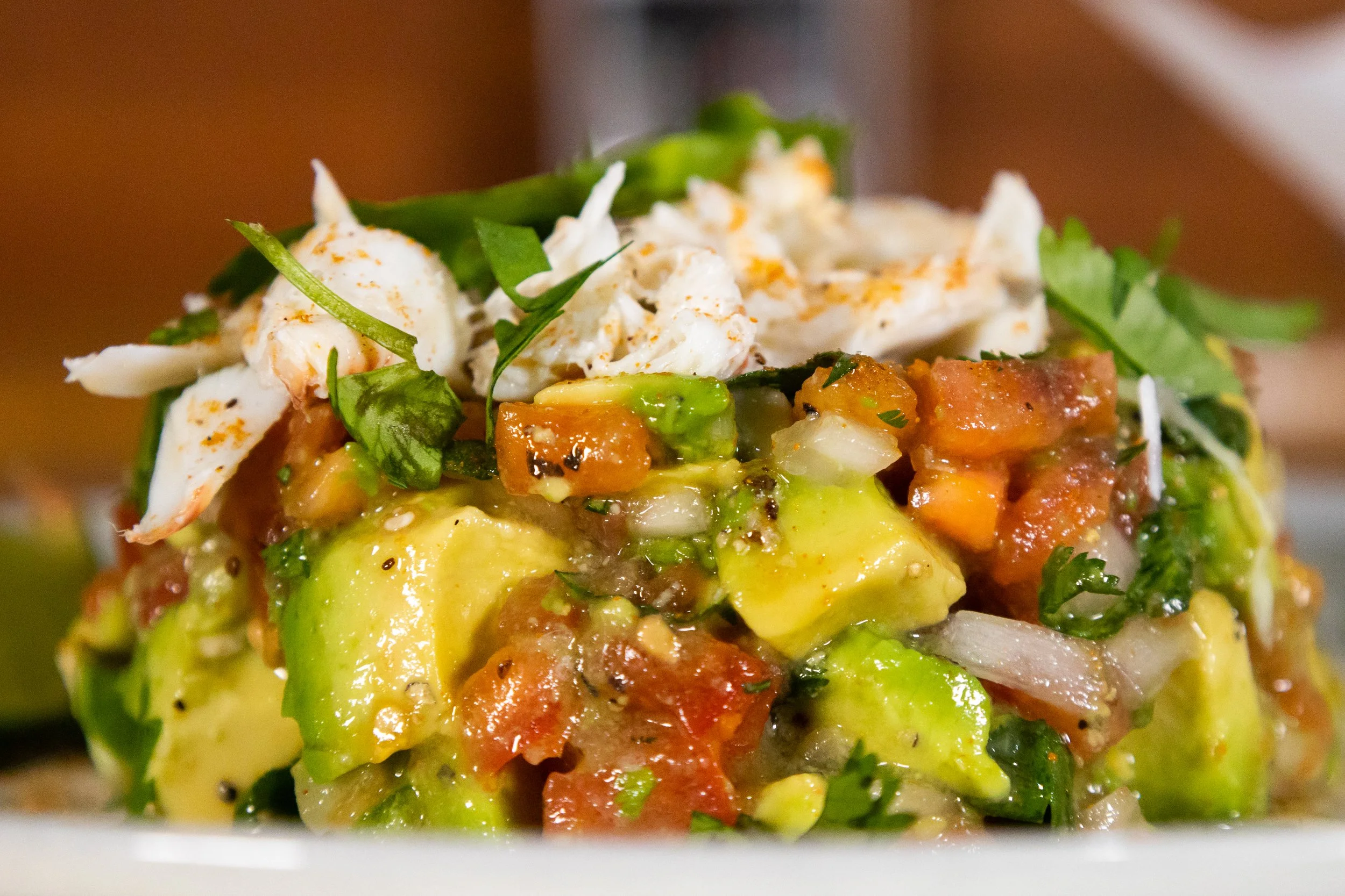 guacamole topped with fresh crab meat