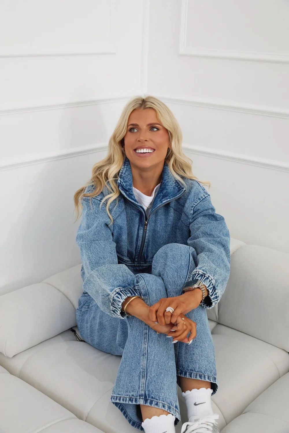 Britt Austin smiling, seated