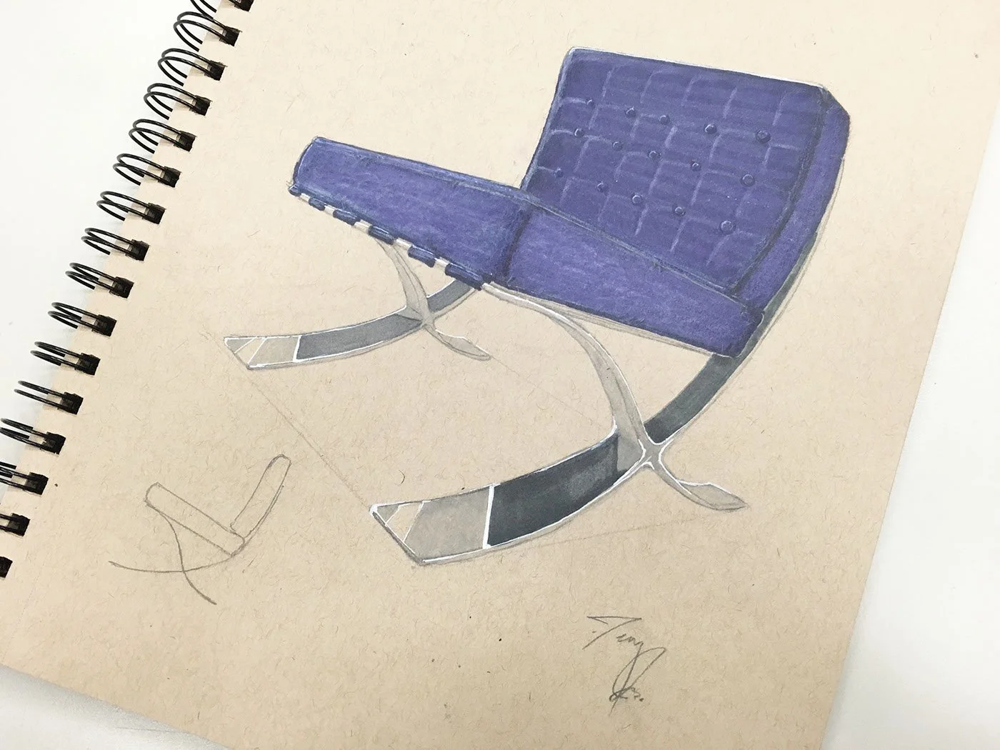 Hand-drawn illustration of a modern blue and gray metal chair on a spiral-bound sketchbook page.